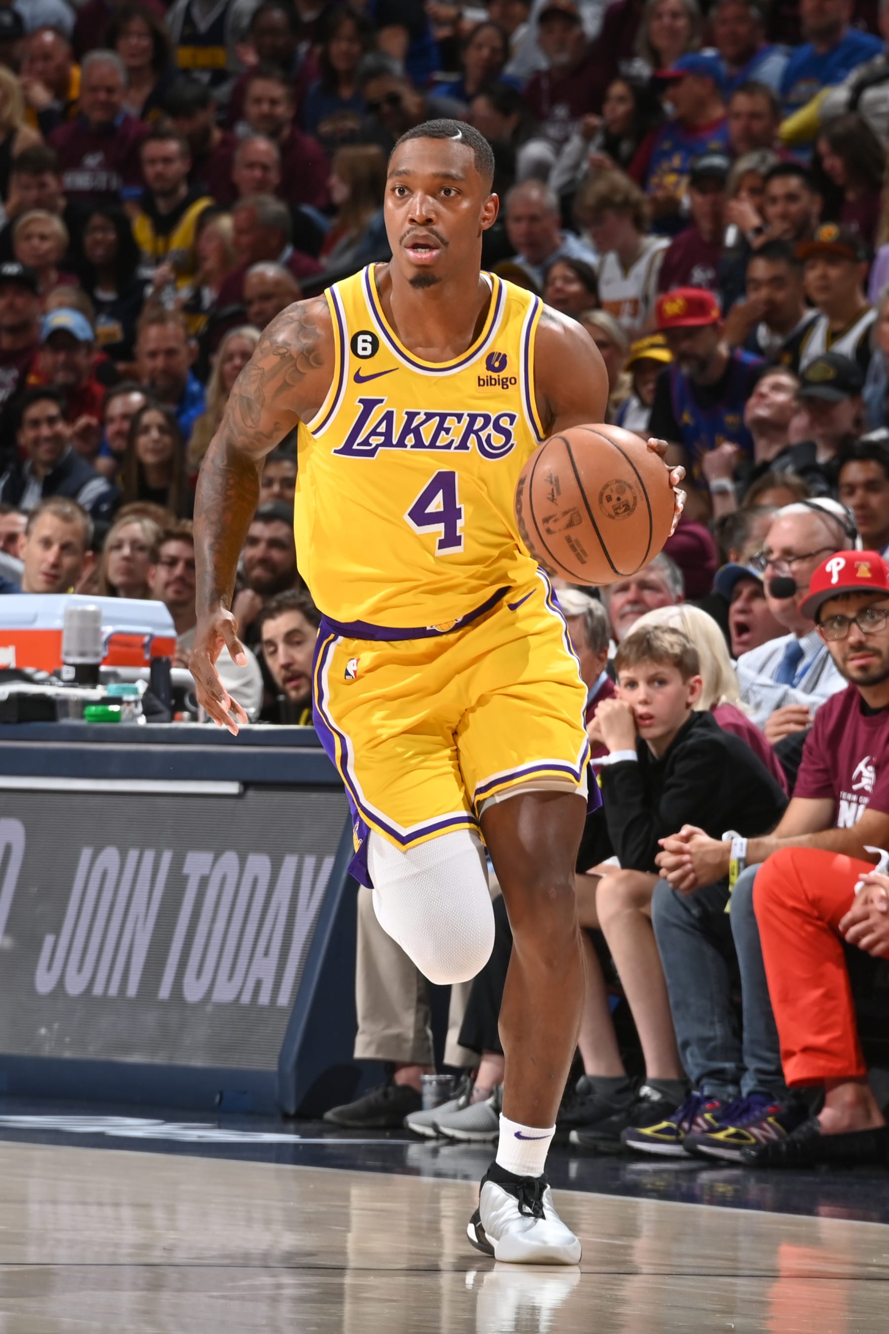 DENVER, CO - MAY 16: Lonnie Walker IV #4 of the Los Angeles Lakers goes to the basket during the game during round 3 game 1 of the 2023 NBA Playoffs Western Conference Finals on May 16, 2023 at the Ball Arena in Denver, Colorado. NOTE TO USER: User expressly acknowledges and agrees that, by downloading and/or using this Photograph, user is consenting to the terms and conditions of the Getty Images License Agreement. Mandatory Copyright Notice: Copyright 2023 NBAE (Photo by Andrew D. Bernstein/NBAE via Getty Images)