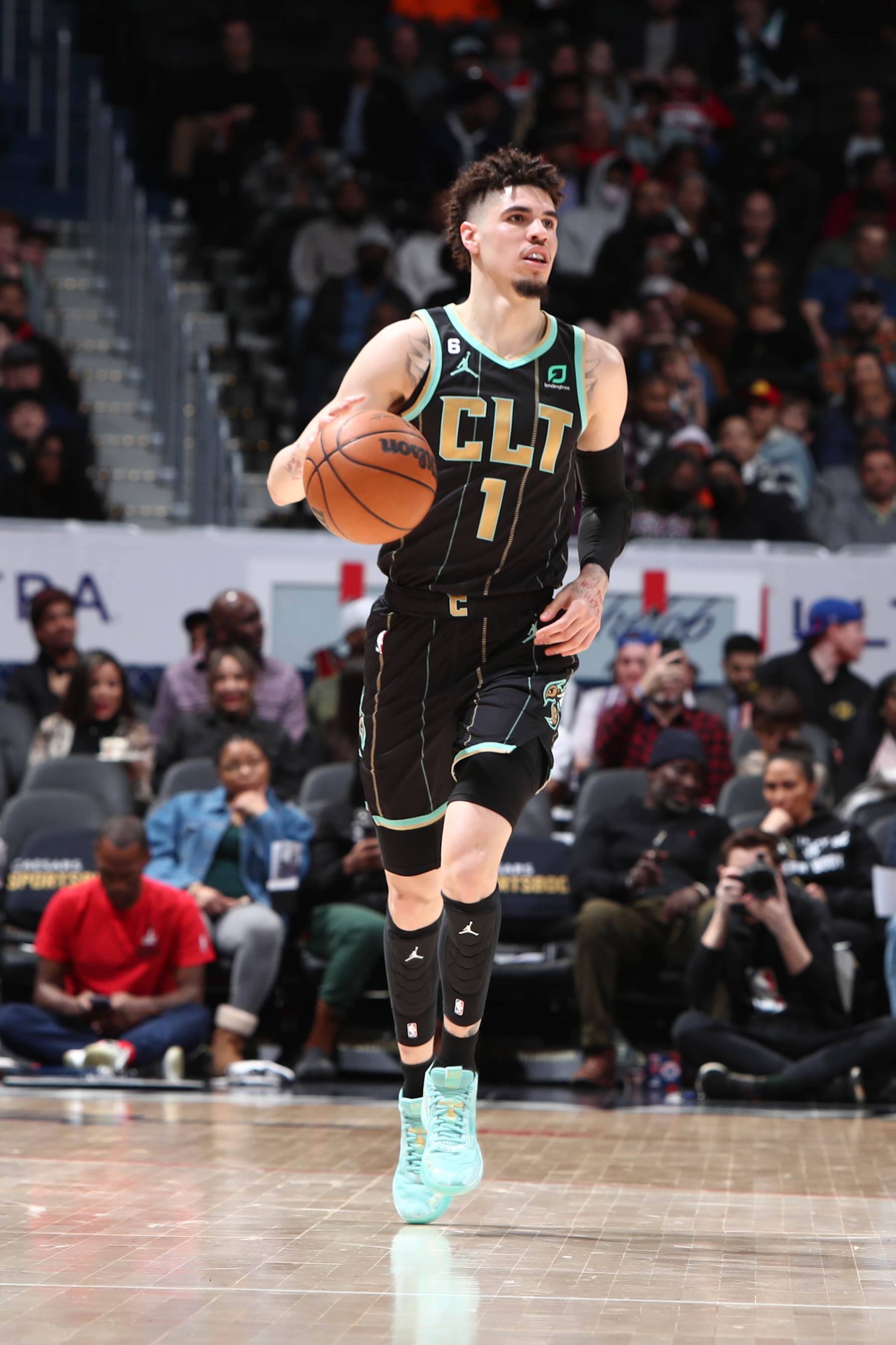 WASHINGTON, DC -  FEBRUARY 8: LaMelo Ball #1 of the Charlotte Hornets dribbles the ball during the game against the Washington Wizards on February 8, 2023 at Capital One Arena in Washington, DC. NOTE TO USER: User expressly acknowledges and agrees that, by downloading and or using this Photograph, user is consenting to the terms and conditions of the Getty Images License Agreement. Mandatory Copyright Notice: Copyright 2023 NBAE (Photo by Kenny Giarla/NBAE via Getty Images)