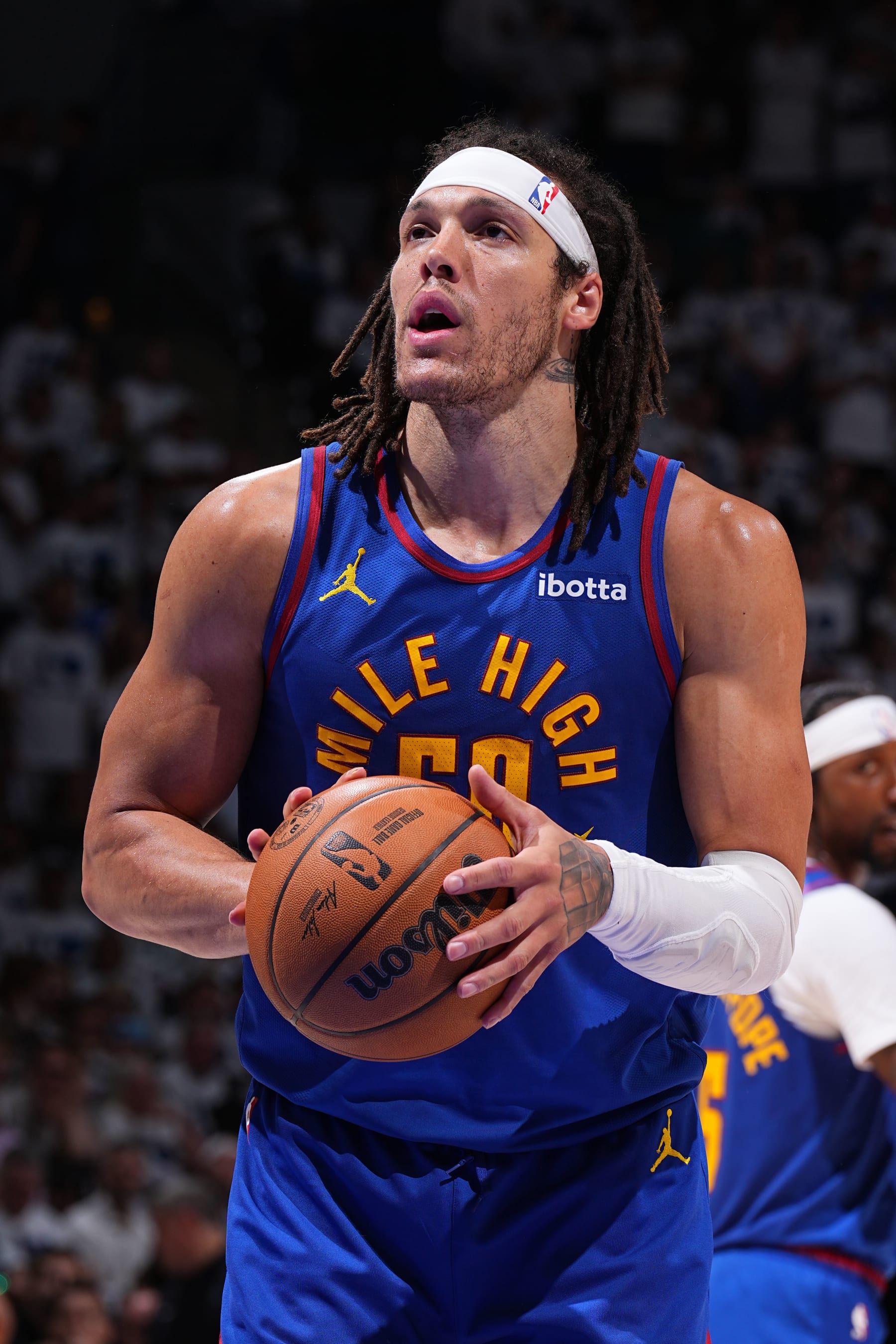 MINNEAPOLIS, MN - MAY 16: Aaron Gordon #50 of the Denver Nuggets shoots a free throw during the game against the Minnesota Timberwolves during Round 2 Game 6 of the 2024 NBA Playoffs on May 16, 2024 at Target Center in Minneapolis, Minnesota. NOTE TO USER: User expressly acknowledges and agrees that, by downloading and or using this Photograph, user is consenting to the terms and conditions of the Getty Images License Agreement. Mandatory Copyright Notice: Copyright 2024 NBAE (Photo by Garrett Ellwood/NBAE via Getty Images)