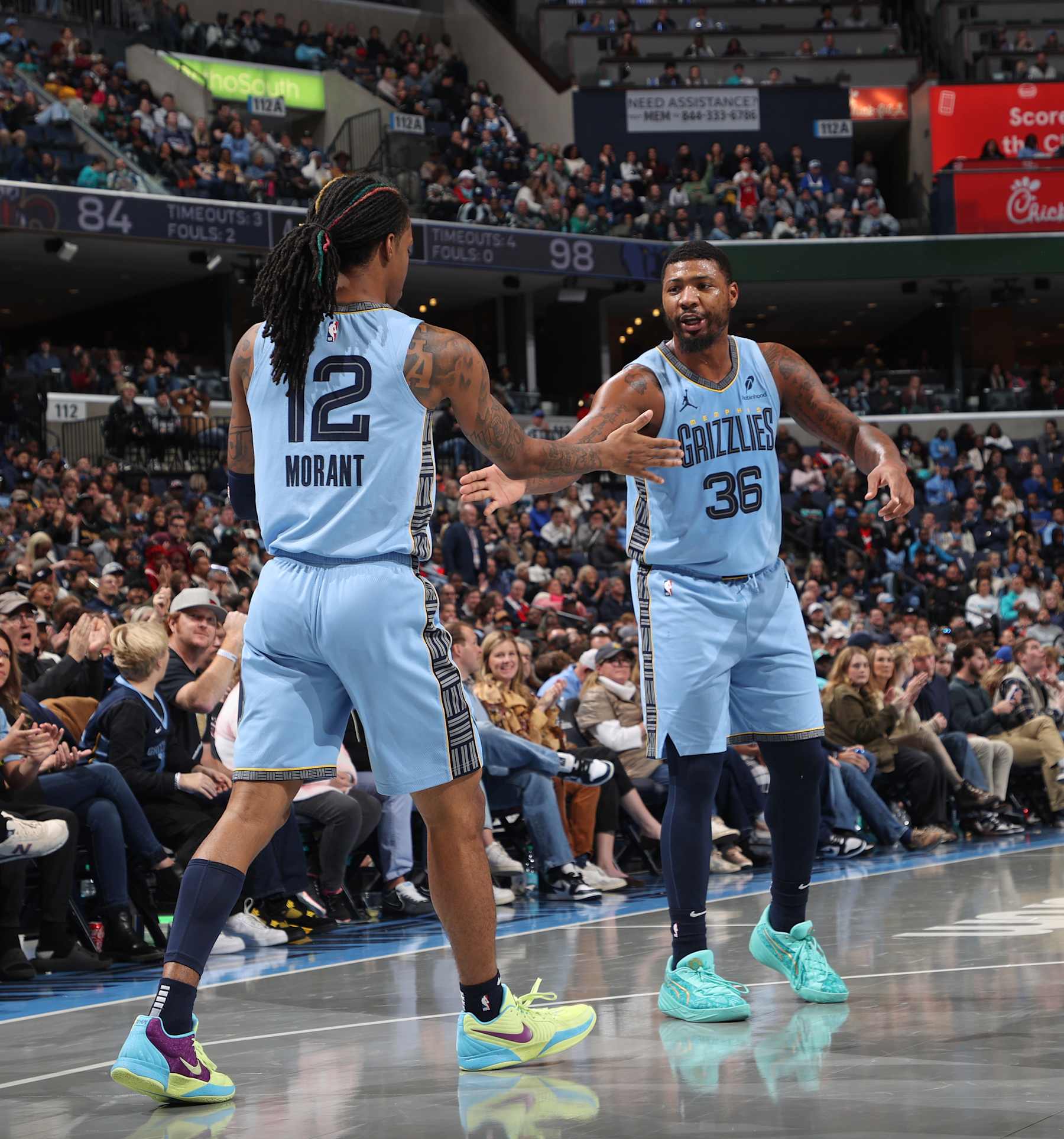 MEMPHIS, TN - NOVEMBER 29: Ja Morant #12 and Marcus Smart #36 of the Memphis Grizzlies high five during the game against the New Orleans Pelicans during the Emirates NBA Cup game on November 29, 2024 at FedExForum in Memphis, Tennessee. NOTE TO USER: User expressly acknowledges and agrees that, by downloading and or using this photograph, User is consenting to the terms and conditions of the Getty Images License Agreement. Mandatory Copyright Notice: Copyright 2024 NBAE (Photo by Joe Murphy/NBAE via Getty Images)