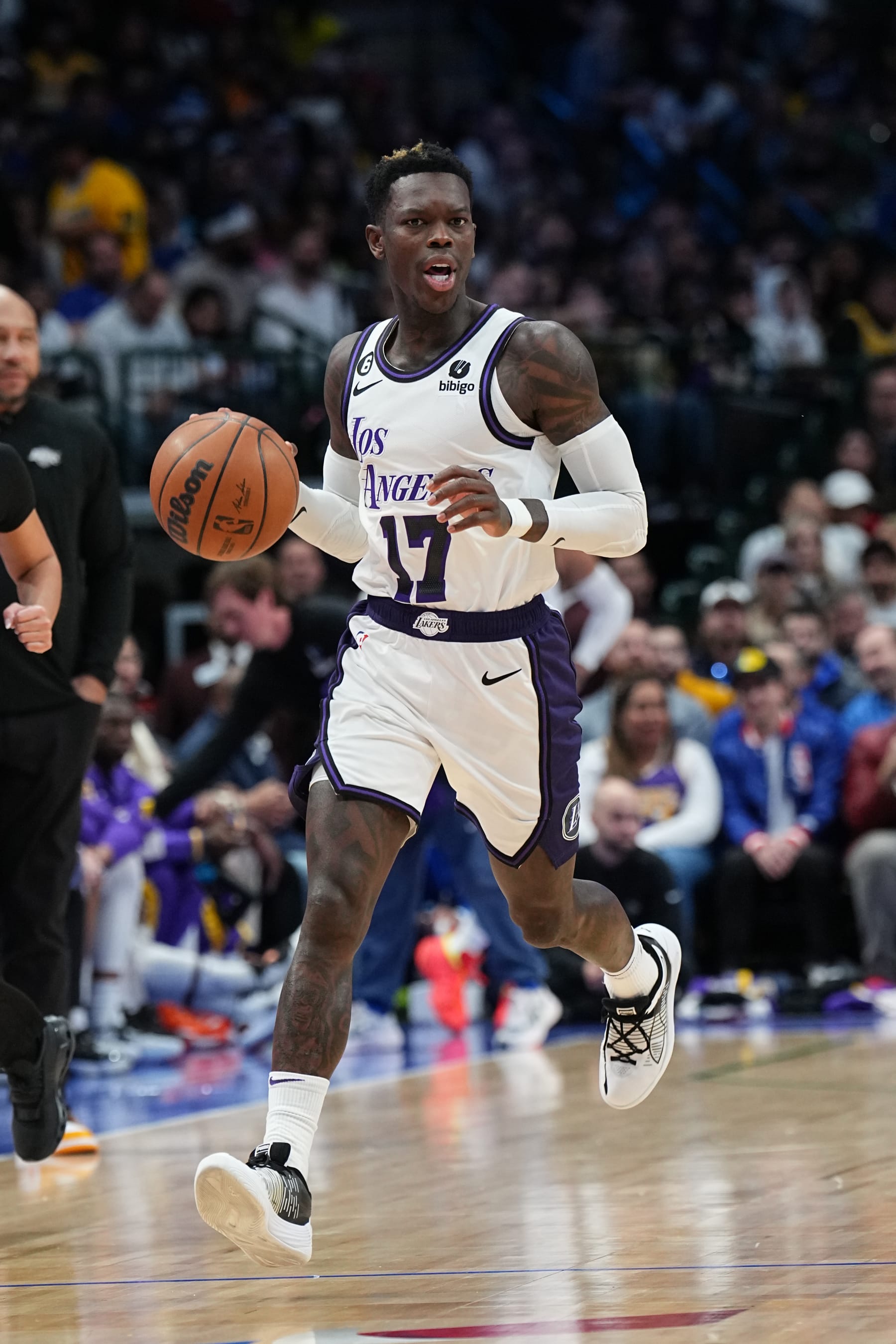 DALLAS, TX - DECEMBER 25: Dennis Schroder #17 of the Los Angeles Lakers dribbles the ball during the game against the Dallas Mavericks on December 25, 2022 at the American Airlines Center in Dallas, Texas. NOTE TO USER: User expressly acknowledges and agrees that, by downloading and or using this photograph, User is consenting to the terms and conditions of the Getty Images License Agreement. Mandatory Copyright Notice: Copyright 2022 NBAE (Photo by Glenn James/NBAE via Getty Images)