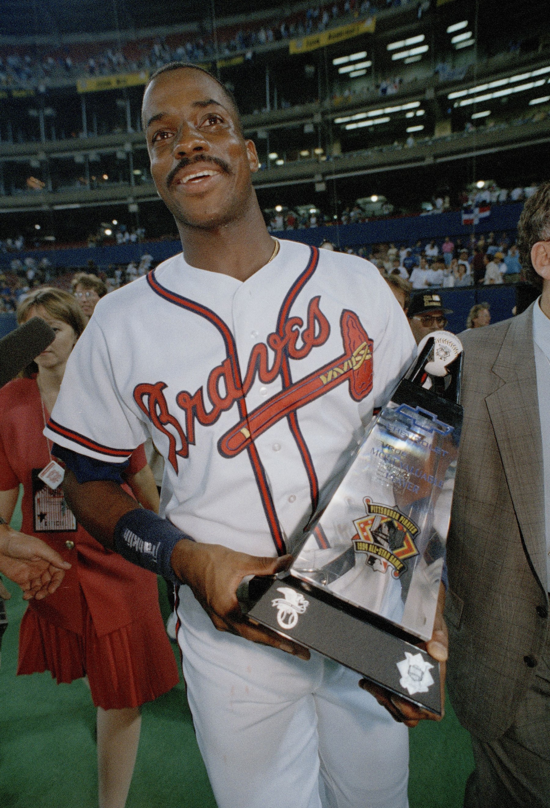 Atlanta Braves Fred McGriff poses with the Most Valuable Player award after the 65th All Star Game at Three Rivers Stadium in Pittsburgh, July 12, 1994. (AP Photo/Gene Puskar)