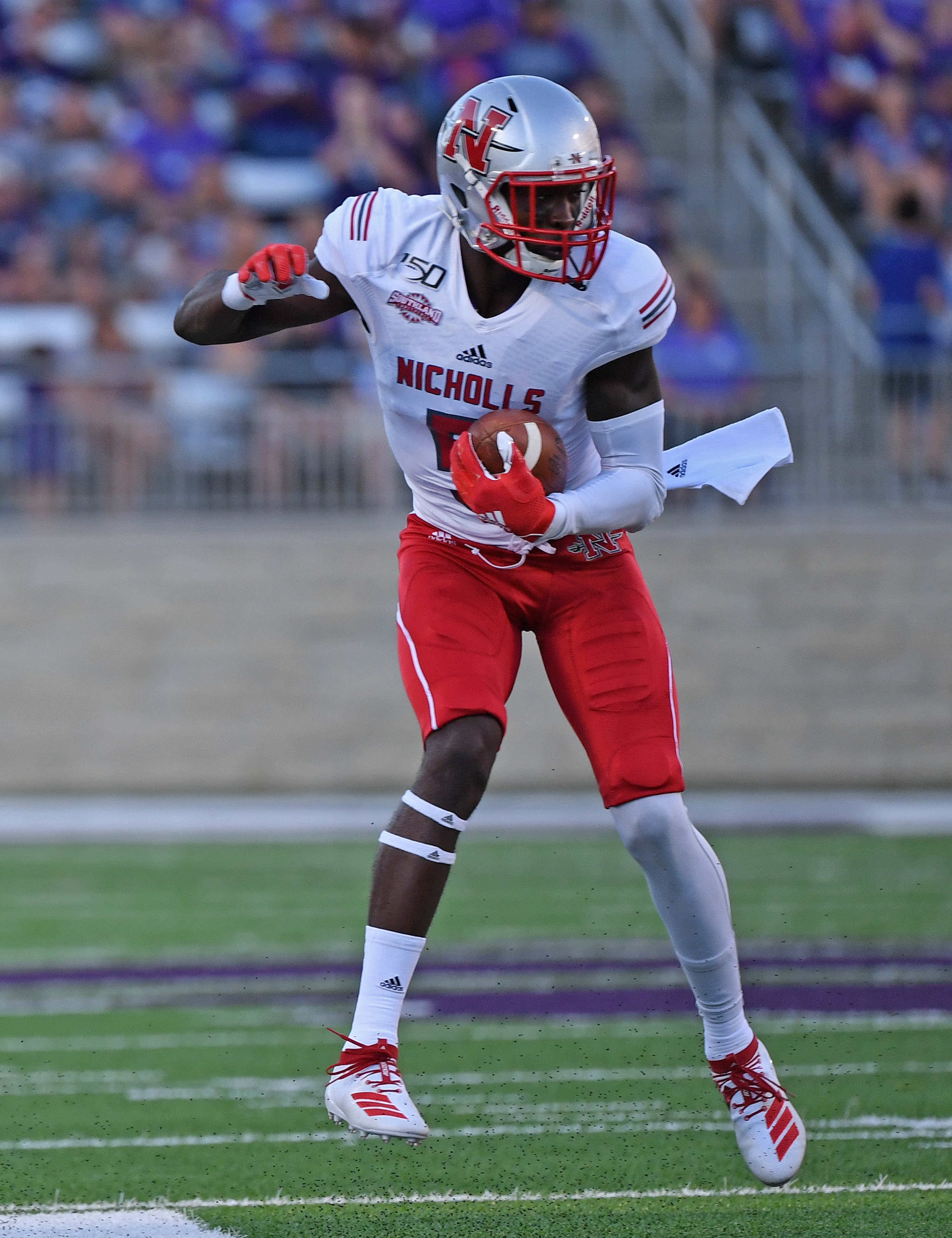 MANHATTAN, KS - AUGUST 31:  Wide receiver Dai'Jean Dixon #5 of the Nicholls State Colonels catches a pass against the Kansas State Wildcats during the first half against at Bill Snyder Family Football Stadium on August 31, 2019 in Manhattan, Kansas. (Photo by Peter G. Aiken/Getty Images)