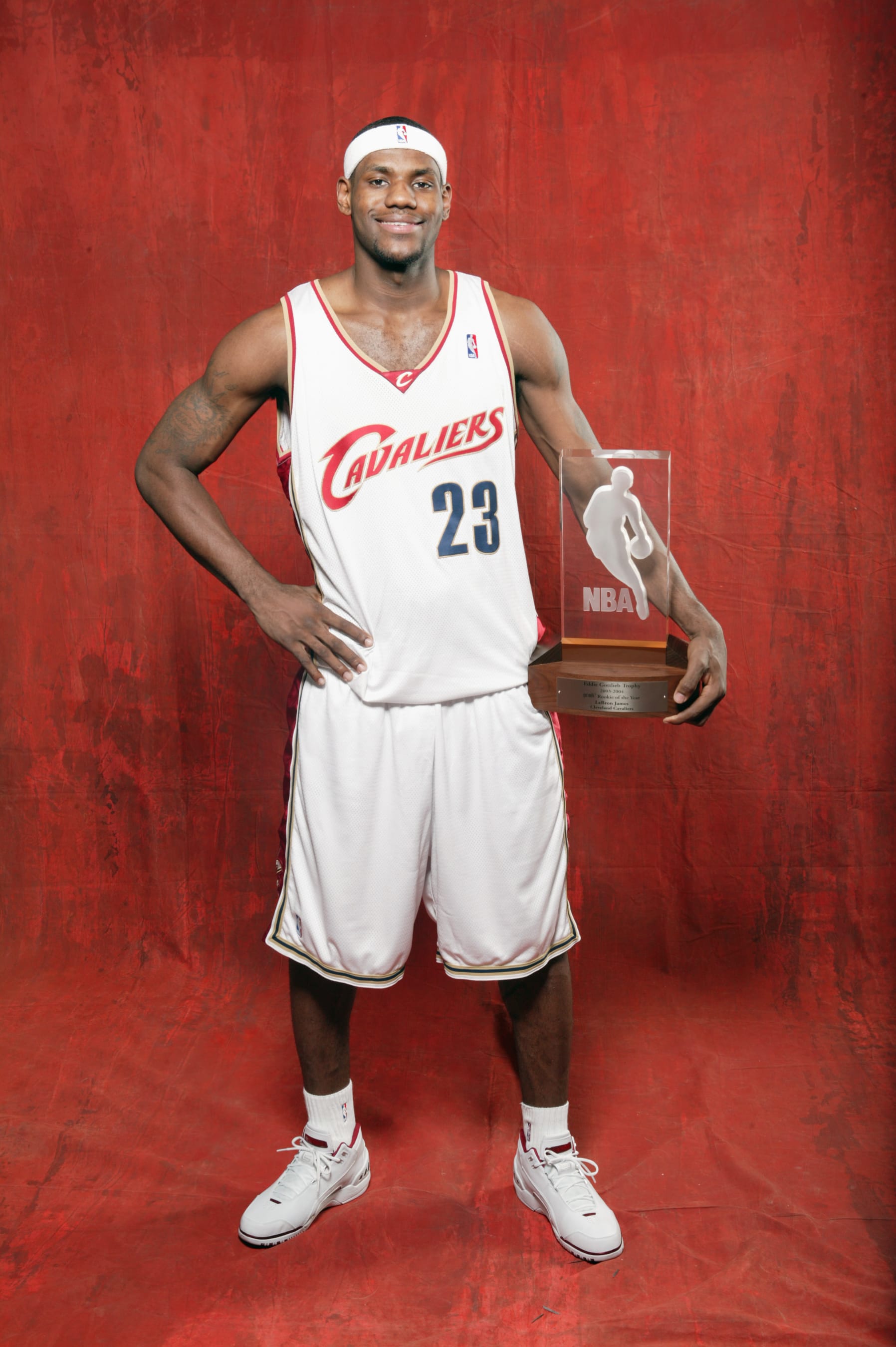 NEW YORK - APRIL 20:  LeBron James #23 of the Cleveland Cavaliers poses with the Got Milk? Rookie of the Year Award on April 20, 2004 in New York, New York.  NOTE TO USER: User expressly acknowledges and agrees that, by downloading and/or using this Photograph, User is consenting to the terms and conditions of the Getty Images Licence Agreement.  (Photo by Nathaniel S. Butler/NBAE via Getty Images)