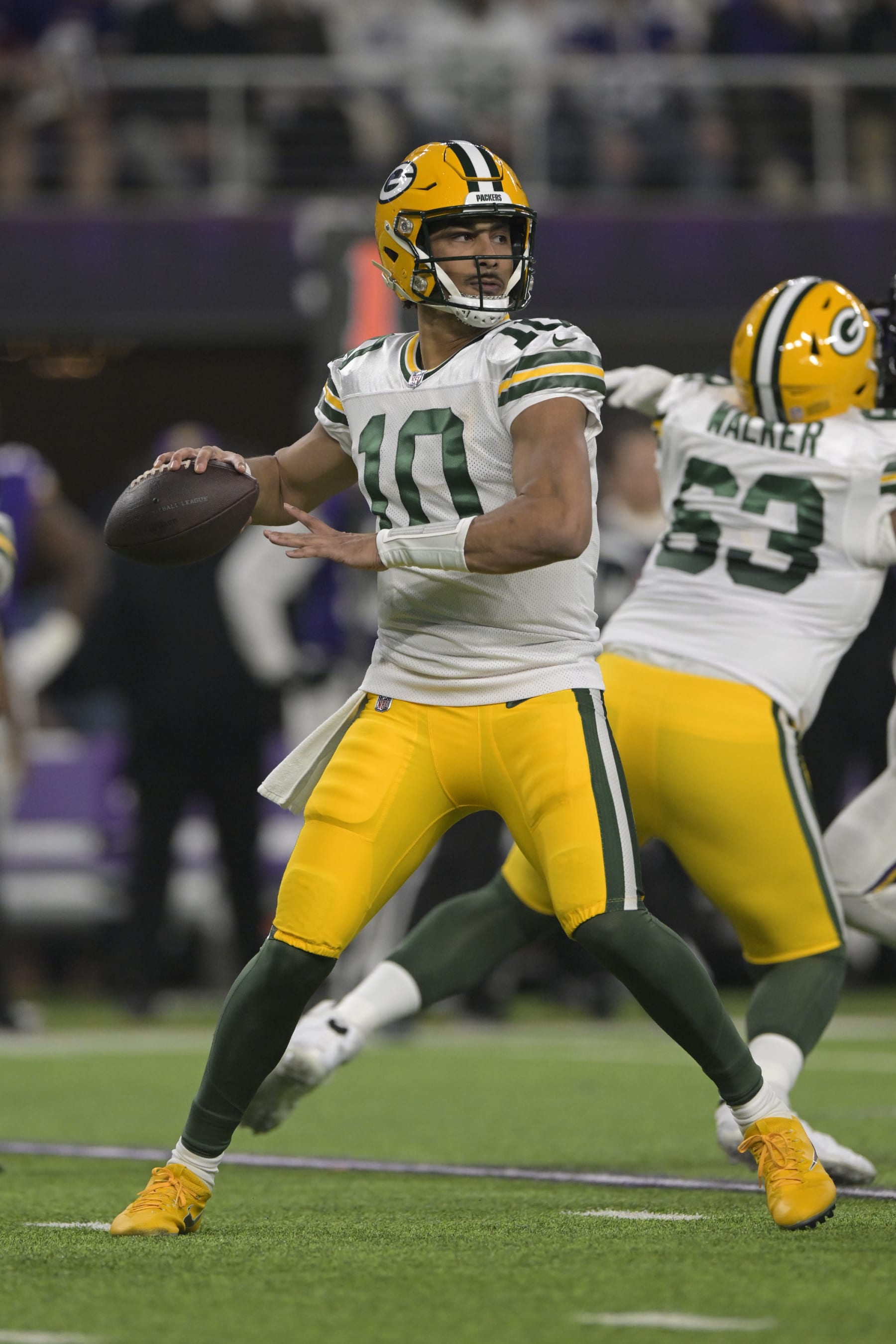MINNEAPOLIS, MN - DECEMBER 31: Green Bay Packers quarterback Jordan Love (10) makes a pass during an NFL game between the Minnesota Vikings and Green Bay Packers on December 31, 2023, at U.S. Bank Stadium in Minneapolis, MN. (Photo by Nick Wosika/Icon Sportswire via Getty Images)