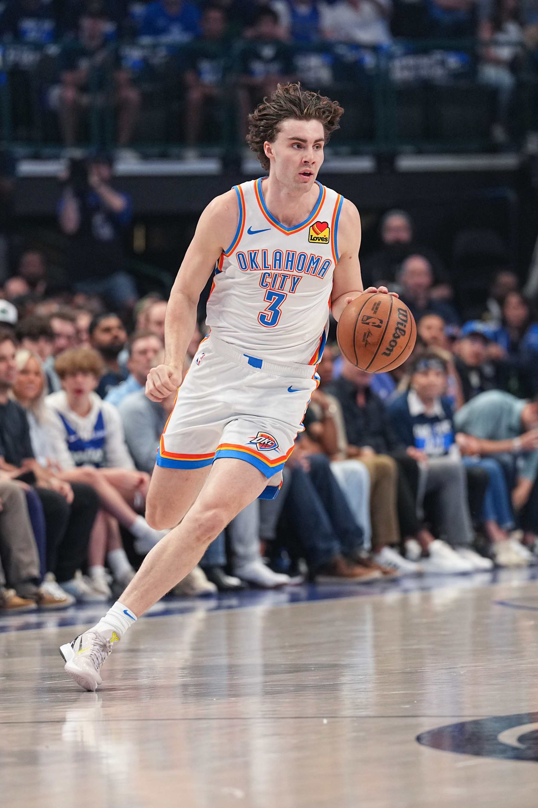 DALLAS, TX - MAY 11: Josh Giddey #3 of the Oklahoma City Thunder handles the ball during the game   against the Dallas Mavericks during Round 2 Game 3 of the 2024 NBA Playoffs  on May 11, 2024  at the American Airlines Center in Dallas, Texas. NOTE TO USER: User expressly acknowledges and agrees that, by downloading and or using this photograph, User is consenting to the terms and conditions of the Getty Images License Agreement. Mandatory Copyright Notice: Copyright 2024 NBAE (Photo by Glenn James/NBAE via Getty Images)