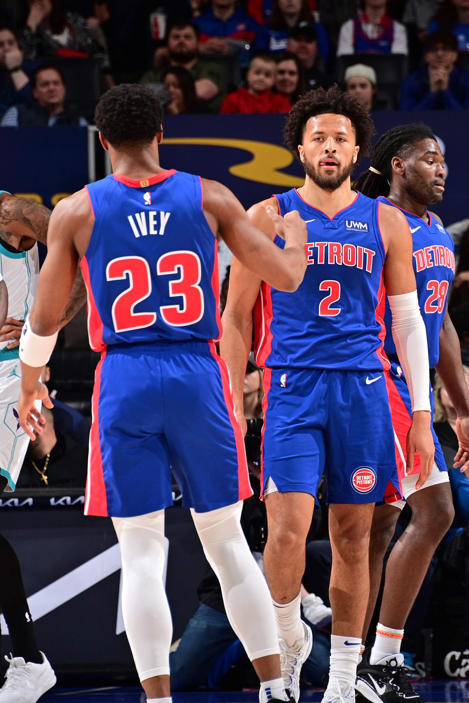 DETROIT, MI - MARCH 11: Jaden Ivey #23 high fives Cade Cunningham #2 of the Detroit Pistons during the game against the Charlotte Hornets  on March 11, 2024 at Little Caesars Arena in Detroit, Michigan. NOTE TO USER: User expressly acknowledges and agrees that, by downloading and/or using this photograph, User is consenting to the terms and conditions of the Getty Images License Agreement. Mandatory Copyright Notice: Copyright 2024 NBAE (Photo by Chris Schwegler/NBAE via Getty Images)
