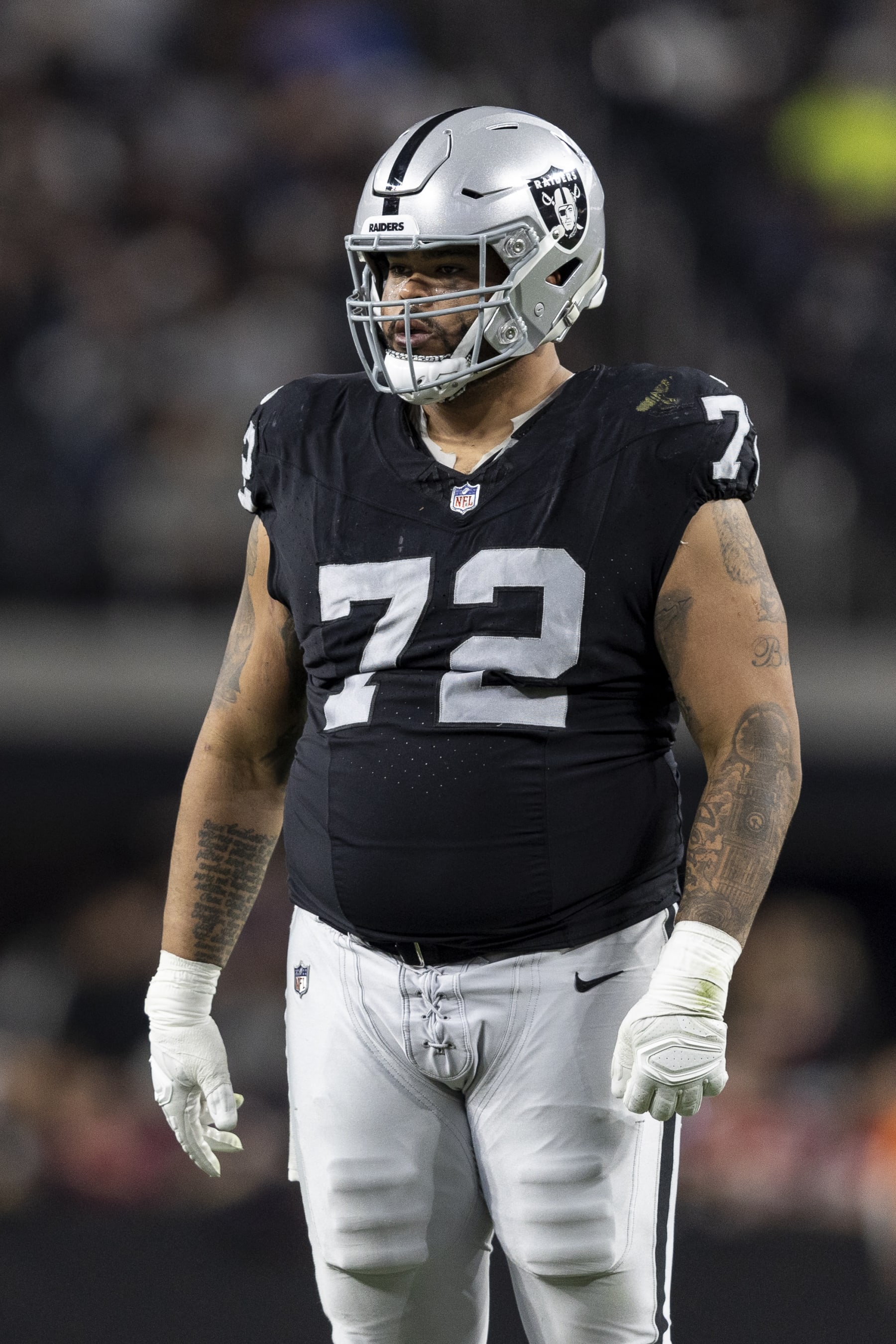 LAS VEGAS, NEVADA - DECEMBER 14: Jermaine Eluemunor #72 of the Las Vegas Raiders looks on during an NFL football game between the Las Vegas Raiders and the Los Angeles Chargers at Allegiant Stadium on December 14, 2023 in Las Vegas, Nevada. (Photo by Michael Owens/Getty Images)