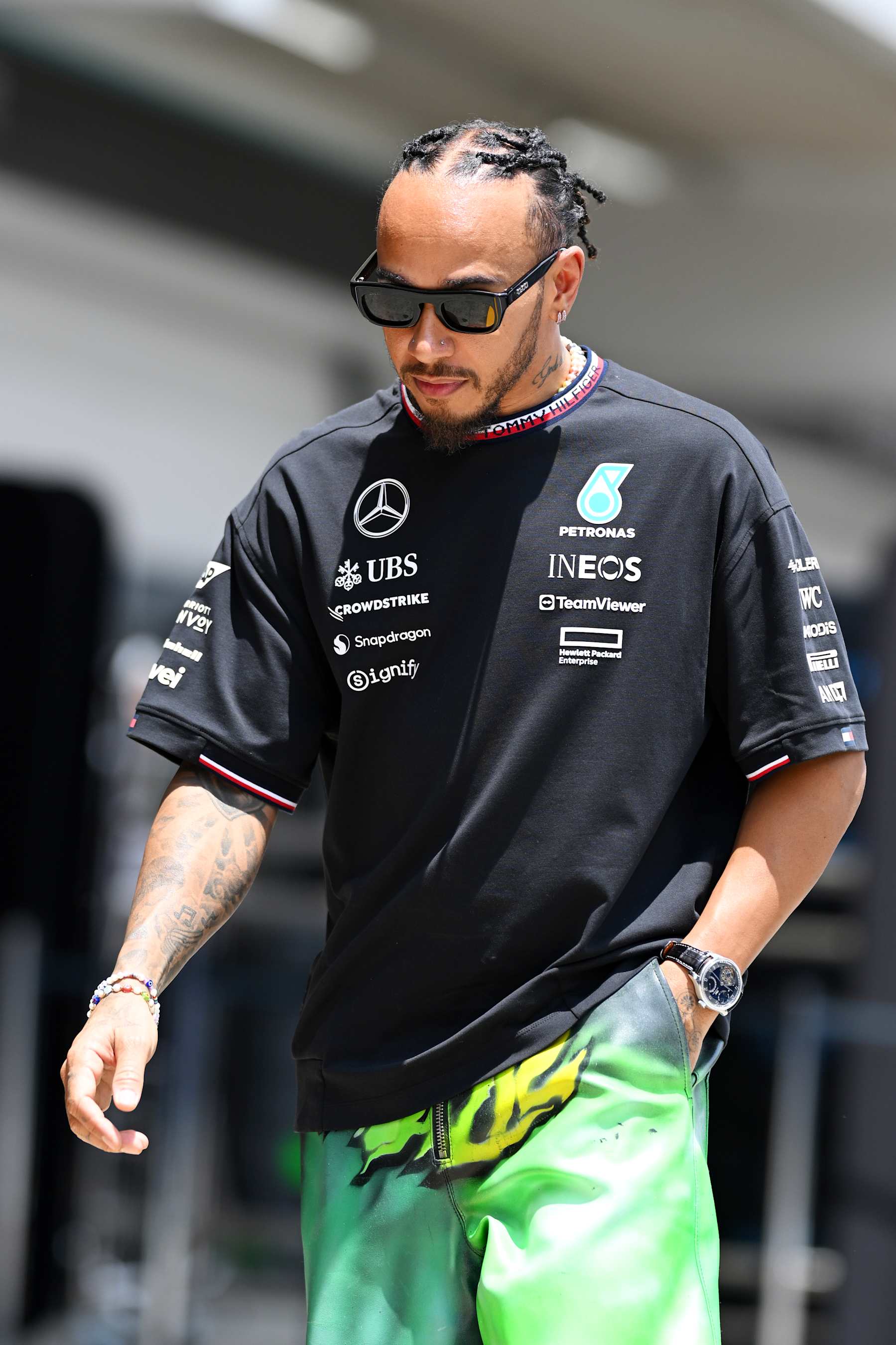 SAO PAULO, BRAZIL - OCTOBER 31: Lewis Hamilton of Great Britain and Mercedes walks in the Paddock during previews ahead of the F1 Grand Prix of Brazil at Autodromo Jose Carlos Pace on October 31, 2024 in Sao Paulo, Brazil. (Photo by Clive Mason/Getty Images)