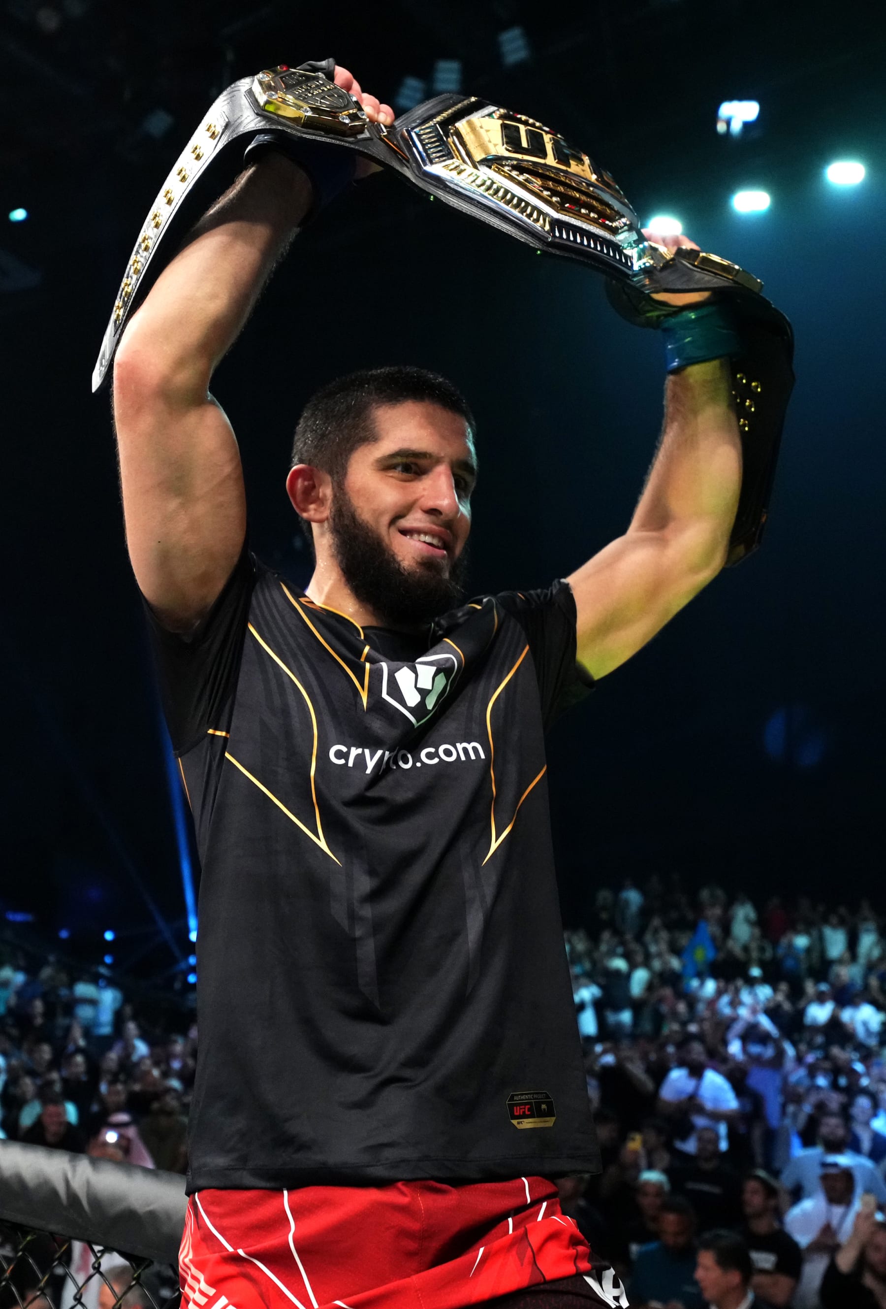 ABU DHABI, UNITED ARAB EMIRATES - OCTOBER 22: Islam Makhachev of Russia celebrates after his victory over Charles Oliveira of Brazil in their UFC lightweight championship fight during the UFC 280 event at Etihad Arena on October 22, 2022 in Abu Dhabi, United Arab Emirates. (Photo by Chris Unger/Zuffa LLC)