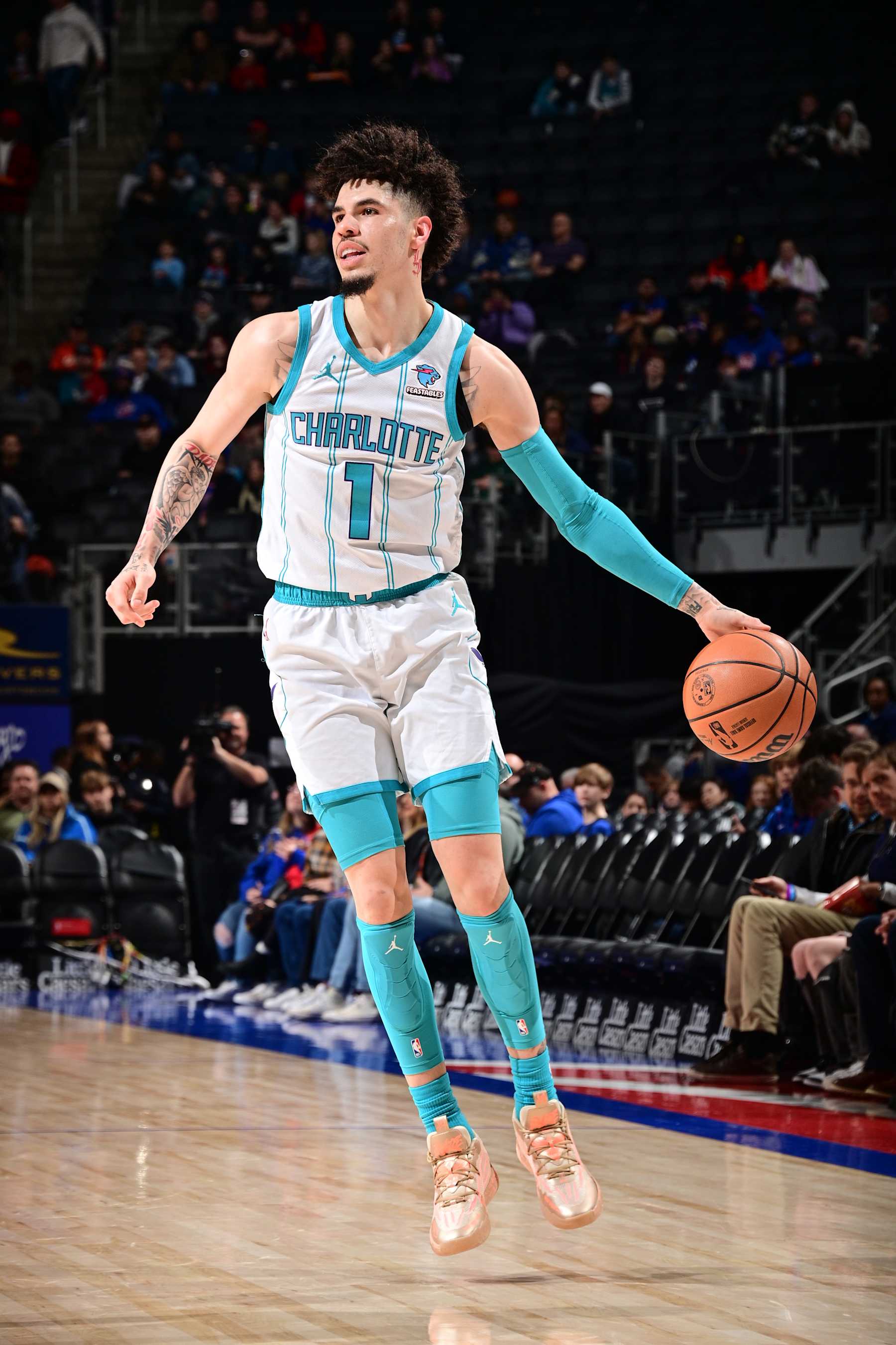 DETROIT, MI - JANUARY 24: LaMelo Ball #1 of the Charlotte Hornets handles the ball during the game against the Detroit Pistons on January 24, 2024 at Little Caesars Arena in Detroit, Michigan. NOTE TO USER: User expressly acknowledges and agrees that, by downloading and/or using this photograph, User is consenting to the terms and conditions of the Getty Images License Agreement. Mandatory Copyright Notice: Copyright 2024 NBAE (Photo by Chris Schwegler/NBAE via Getty Images)