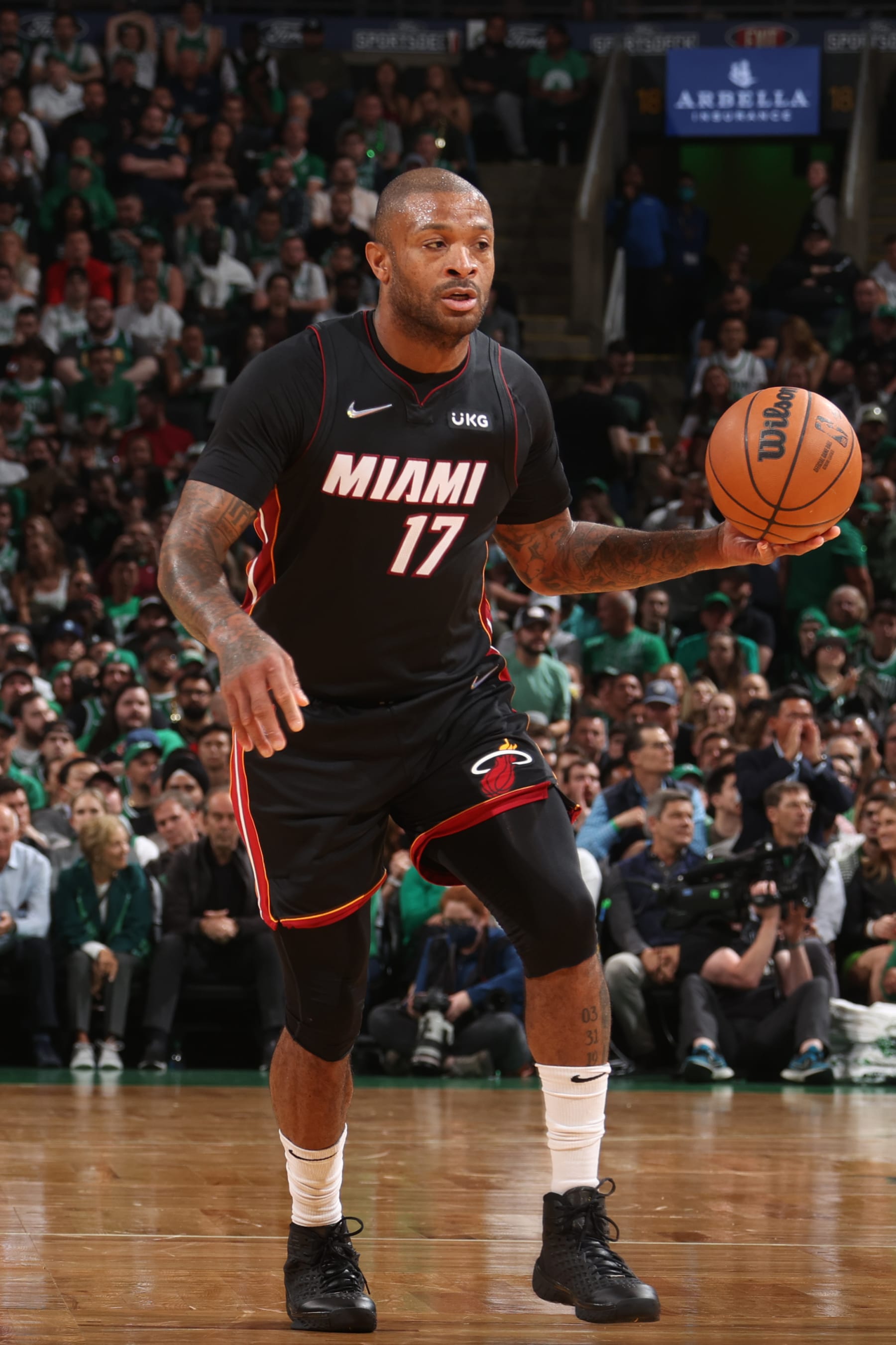 BOSTON, MA - MAY 23: P.J. Tucker #17 of the Miami Heat dribbles the ball against the Boston Celtics during Game 4 of the 2022 NBA Playoffs Eastern Conference Finals on May 23, 2022 at the TD Garden in Boston, Massachusetts.  NOTE TO USER: User expressly acknowledges and agrees that, by downloading and or using this photograph, User is consenting to the terms and conditions of the Getty Images License Agreement. Mandatory Copyright Notice: Copyright 2022 NBAE  (Photo by Nathaniel S. Butler/NBAE via Getty Images)