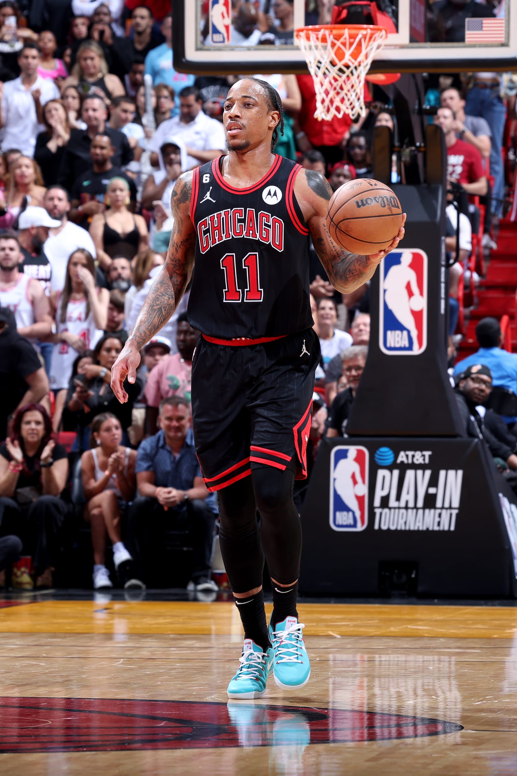 MIAMI, FL - APRIL 14: DeMar DeRozan #11 of the Chicago Bulls handles the ball during the game against the Miami Heat During the 2023 Play-in Tournament on April 14, 2023 at Kaseya Center in Miami, Florida. NOTE TO USER: User expressly acknowledges and agrees that, by downloading and or using this photograph, User is consenting to the terms and conditions of the Getty Images License Agreement. Mandatory Copyright Notice: Copyright 2023 NBAE (Photo by Jeff Haynes/NBAE via Getty Images)