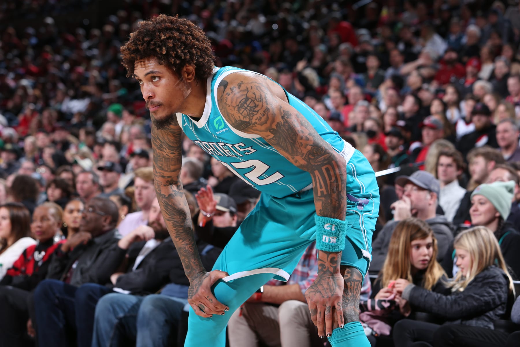 PORTLAND, OR - DECEMBER 26:  Kelly Oubre Jr. #12 of the Charlotte Hornets looks on during the game against the Portland Trail Blazers on December 26, 2022 at the Moda Center Arena in Portland, Oregon. NOTE TO USER: User expressly acknowledges and agrees that, by downloading and or using this photograph, user is consenting to the terms and conditions of the Getty Images License Agreement. Mandatory Copyright Notice: Copyright 2022 NBAE (Photo by Sam Forencich/NBAE via Getty Images)
