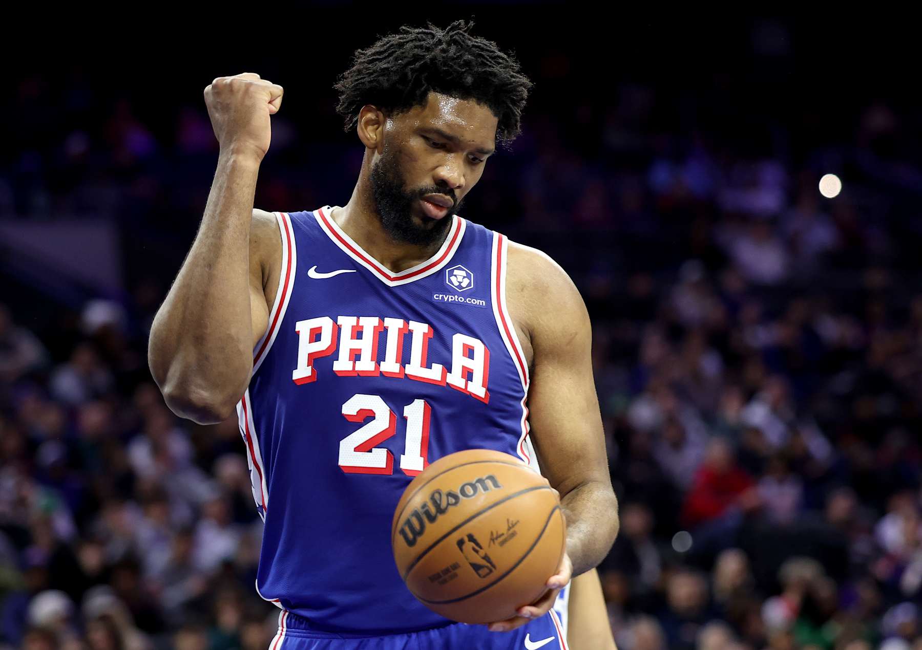 PHILADELPHIA, PENNSYLVANIA - FEBRUARY 04: Joel Embiid #21 of the Philadelphia 76ers reacts to a foul during the first half of the game against the Dallas Mavericks at the Wells Fargo Center on February 04, 2025 in Philadelphia, Pennsylvania. NOTE TO USER: User expressly acknowledges and agrees that, by downloading and or using this photograph, User is consenting to the terms and conditions of the Getty Images License Agreement. (Photo by Emilee Chinn/Getty Images)