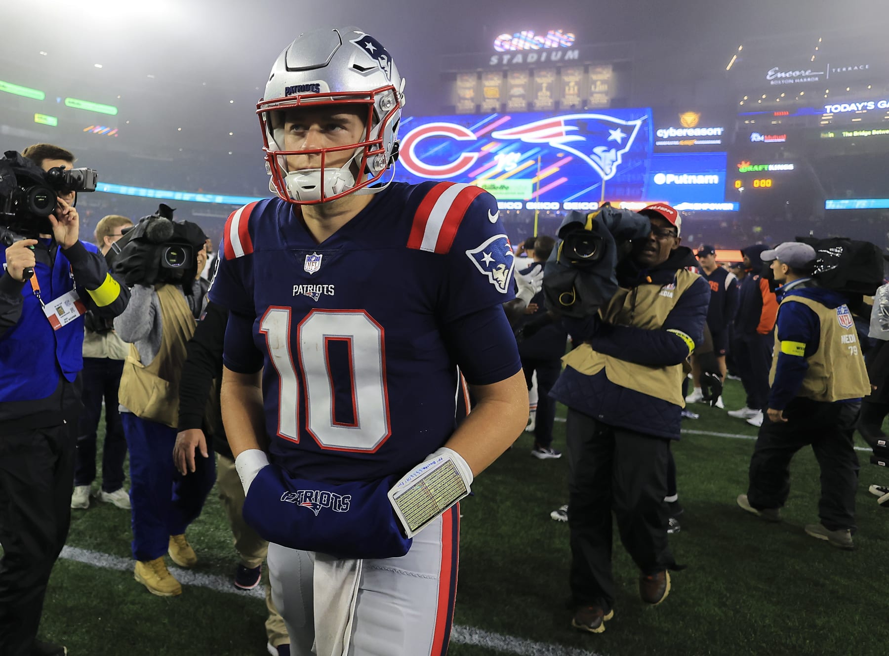 Foxborough, MA - October 24: New England Patriots QB Mac Jones walks off the field after the Patriots lost to the Chicago Bears 33-14. (Photo by Matthew J. Lee/The Boston Globe via Getty Images)
