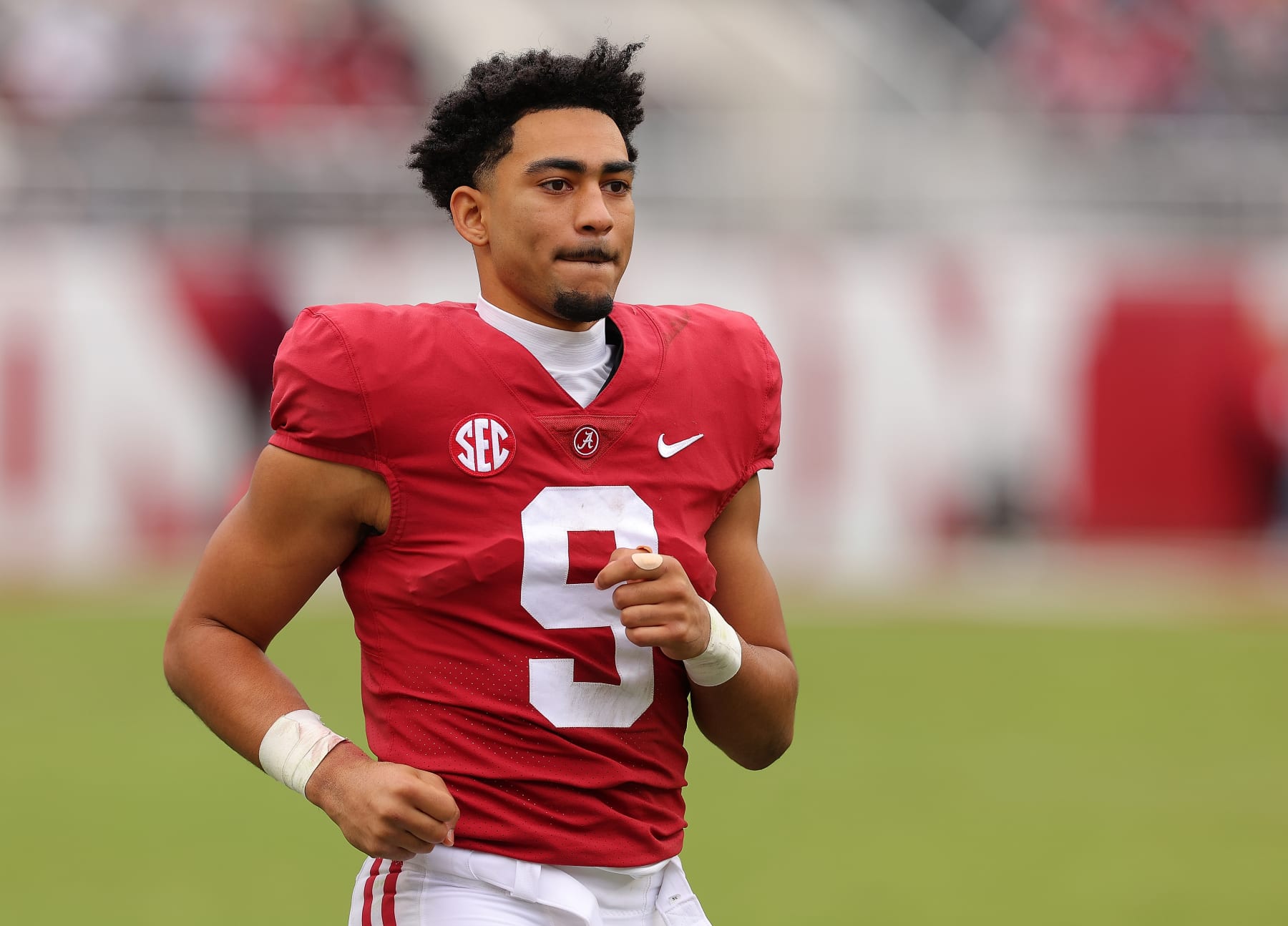 TUSCALOOSA, ALABAMA - NOVEMBER 19:  Bryce Young #9 of the Alabama Crimson Tide runs to the offensive huddle in the fourth quarter against the Austin Peay Governors at Bryant-Denny Stadium on November 19, 2022 in Tuscaloosa, Alabama. (Photo by Kevin C. Cox/Getty Images)