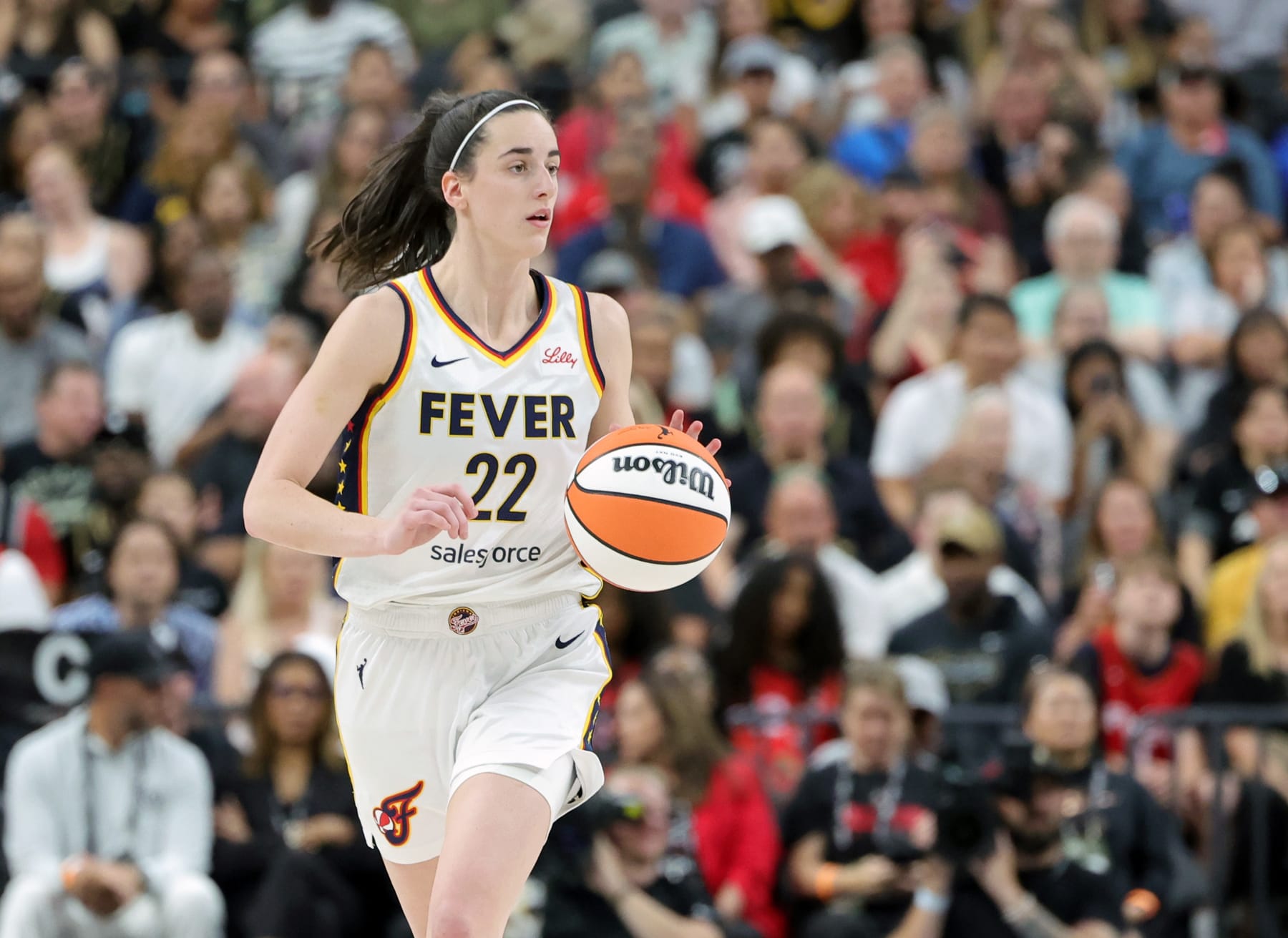 LAS VEGAS, NEVADA - JULY 02: Caitlin Clark #22 of the Indiana Fever brings the ball up the court against the Las Vegas Aces in the first quarter of their game at T-Mobile Arena on July 02, 2024 in Las Vegas, Nevada. The Aces defeated the Fever 88-69. NOTE TO USER: User expressly acknowledges and agrees that, by downloading and or using this photograph, User is consenting to the terms and conditions of the Getty Images License Agreement. (Photo by Ethan Miller/Getty Images)