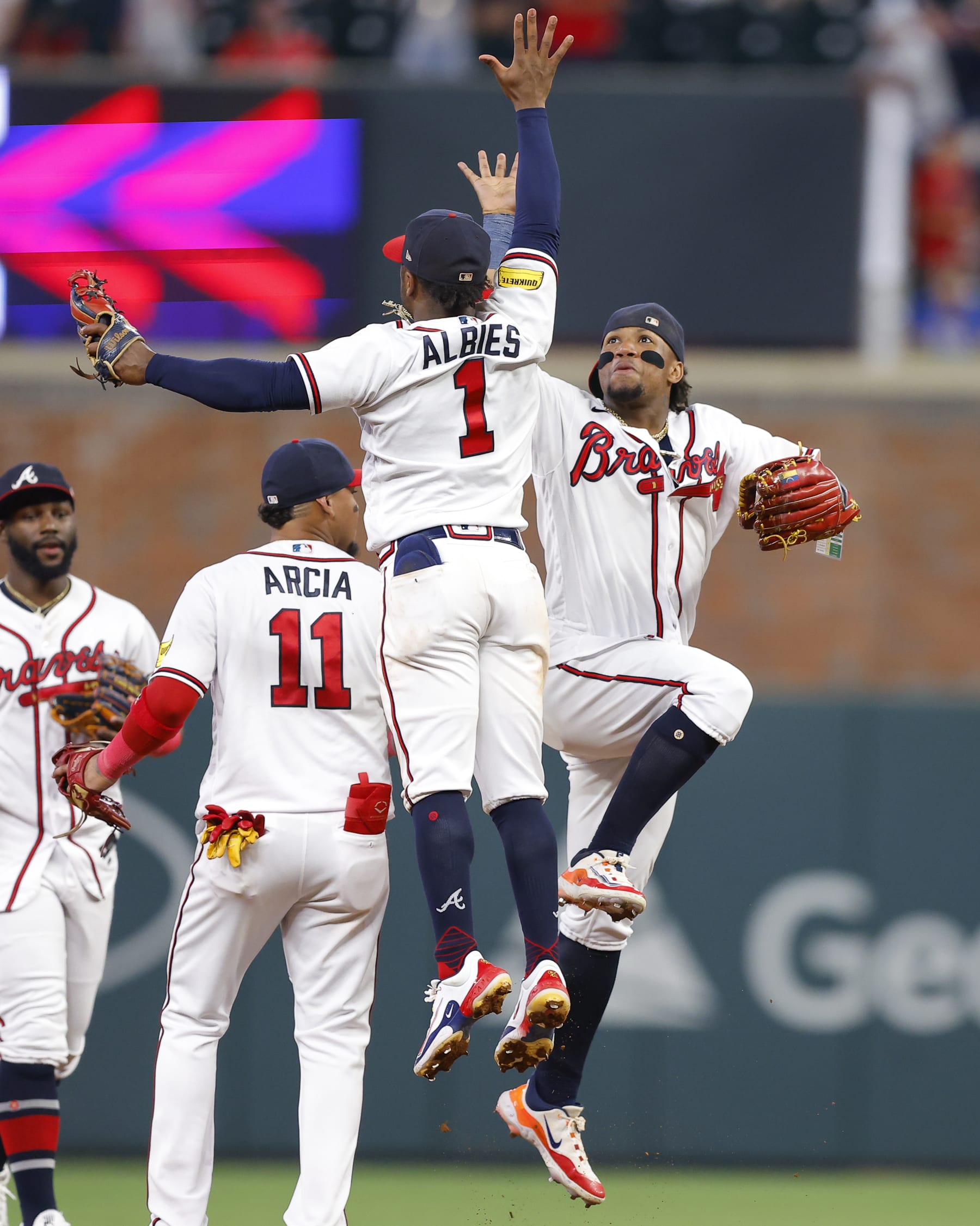 ATLANTA, GA - JUNE 27: Ronald Acuna Jr. #13 reacts with Ozzie Albies #1 of the Atlanta Braves at the conclusion of the 6-2 victory over the Minnesota Twins at Truist Park on June 27, 2023 in Atlanta, Georgia. (Photo by Todd Kirkland/Getty Images) ATLANTA, GA - JUNE 27: Ronald Acuna Jr. #13 reacts with Ozzie Albies #1 of the Atlanta Braves at the conclusion of the 6-2 victory over the Minnesota Twins at Truist Park on June 27, 2023 in Atlanta, Georgia. (Photo by Todd Kirkland/Getty Images)