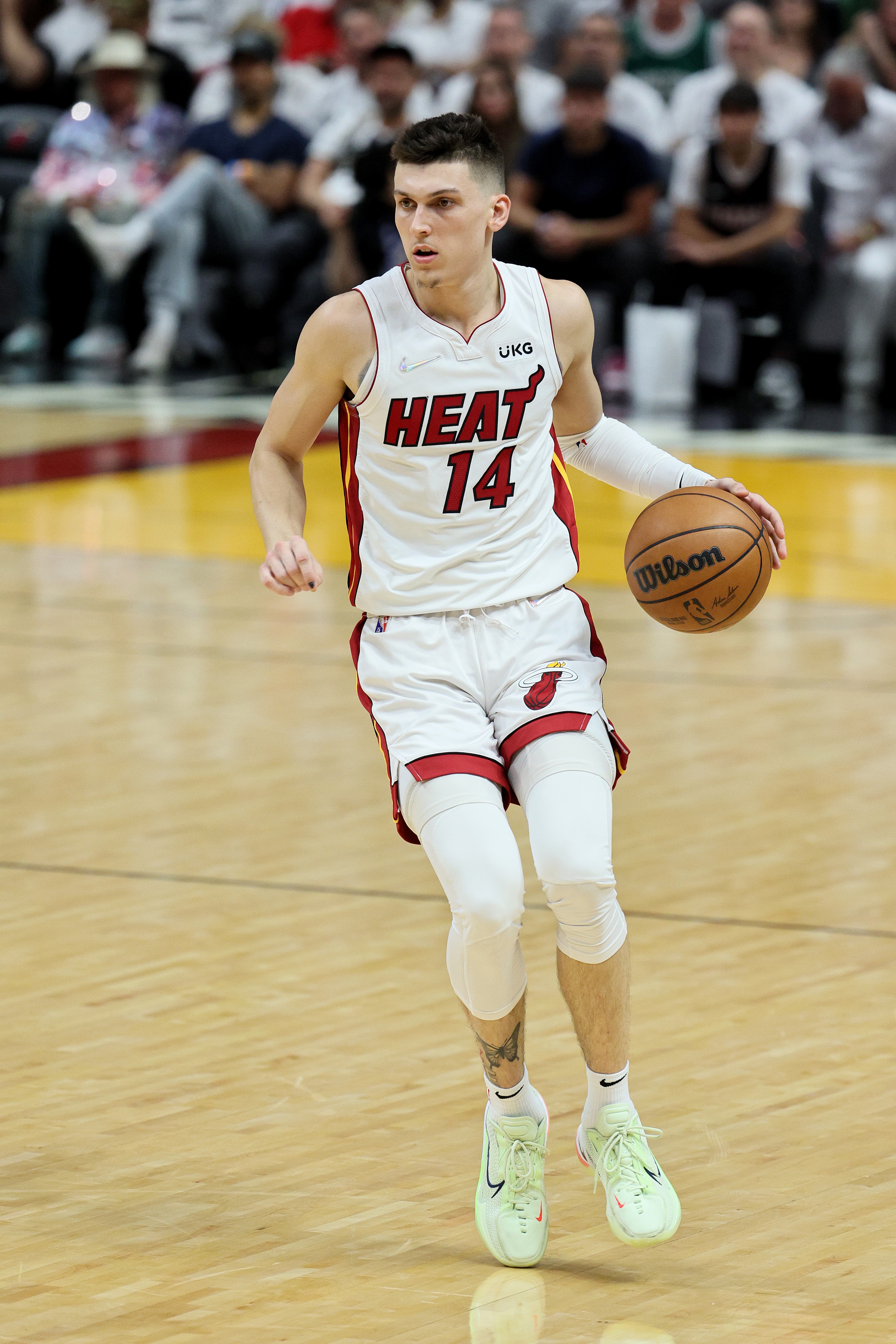 MIAMI, FLORIDA - MAY 29: Tyler Herro #14 of the Miami Heat dribbles against the Boston Celtics during the second quarter in Game Seven of the 2022 NBA Playoffs Eastern Conference Finals at FTX Arena on May 29, 2022 in Miami, Florida. NOTE TO USER: User expressly acknowledges and agrees that, by downloading and/or using this photograph, User is consenting to the terms and conditions of the Getty Images License Agreement. (Photo by Andy Lyons/Getty Images) MIAMI, FLORIDA - MAY 29: Tyler Herro #14 of the Miami Heat dribbles against the Boston Celtics during the second quarter in Game Seven of the 2022 NBA Playoffs Eastern Conference Finals at FTX Arena on May 29, 2022 in Miami, Florida. NOTE TO USER: User expressly acknowledges and agrees that, by downloading and/or using this photograph, User is consenting to the terms and conditions of the Getty Images License Agreement. (Photo by Andy Lyons/Getty Images)