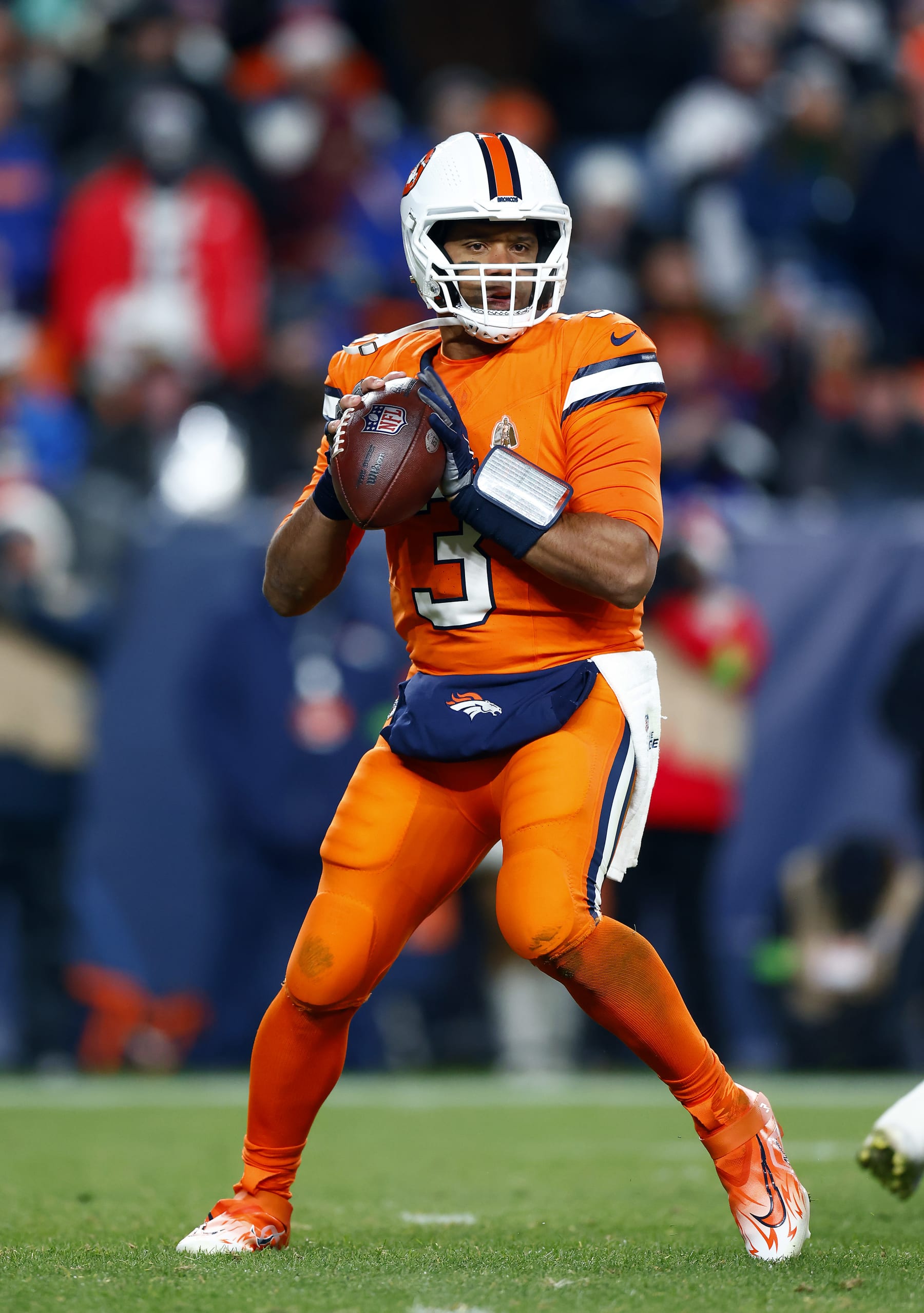 DENVER, COLORADO - DECEMBER 24:  Quarterback Russell Wilson #3 of the Denver Broncos passes during the 2nd quarter of the game against the New England Patriots at Empower Field At Mile High on December 24, 2023 in Denver, Colorado. (Photo by Justin Edmonds/Getty Images)