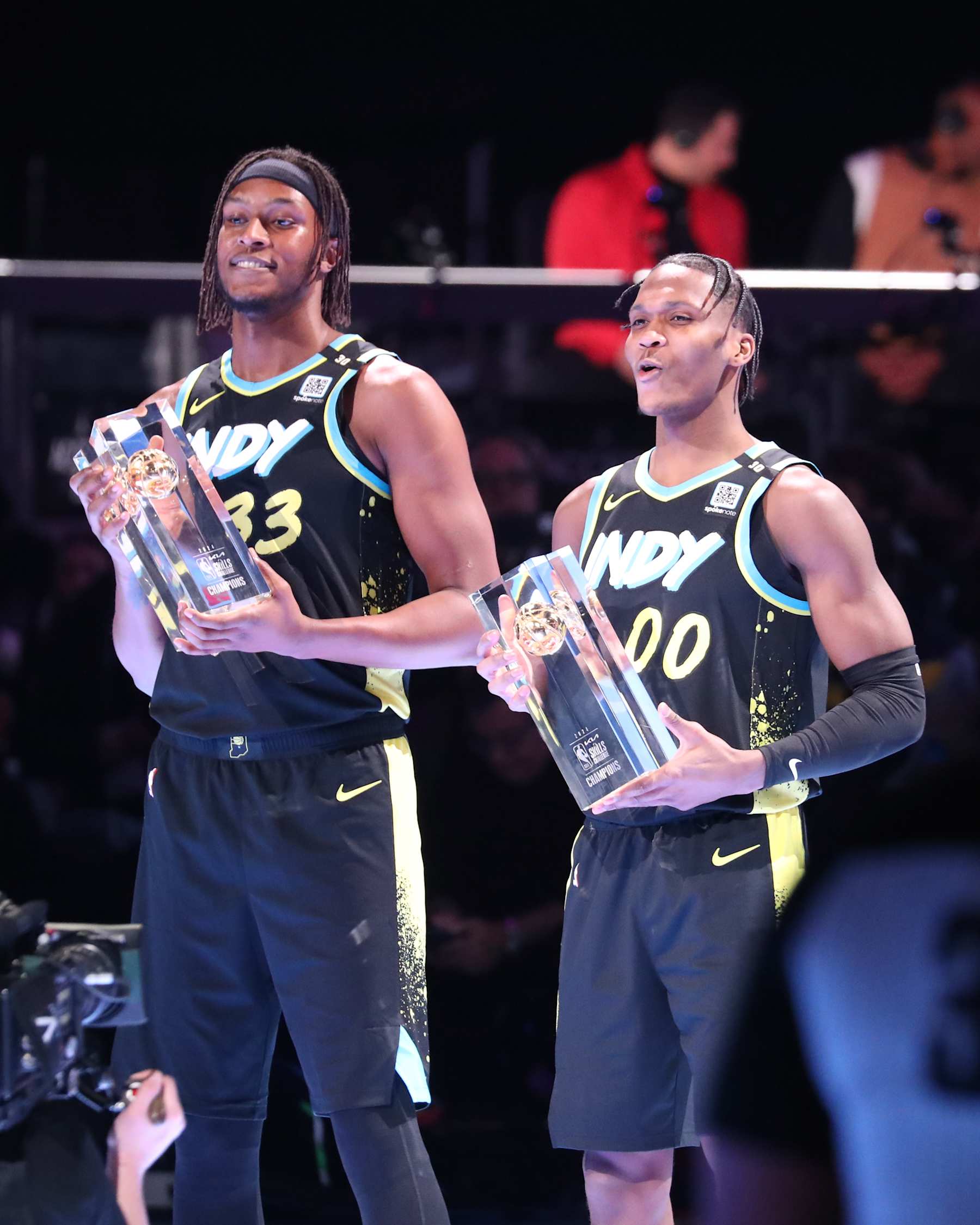 INDIANAPOLIS, IN - FEBRUARY 17: Myles Turner #33 and Bennedict Mathurin #00 of the Indiana Pacers are presented with trophies after the KIA Skills Challenge during the State Farm All-Star Saturday Night as a part of State Farm All-Star Saturday Night on Saturday, February 17, 2024 at Lucas Oil Stadium in Indianapolis, Indiana. NOTE TO USER: User expressly acknowledges and agrees that, by downloading and/or using this Photograph, user is consenting to the terms and conditions of the Getty Images License Agreement. Mandatory Copyright Notice: Copyright 2024 NBAE (Photo by Gary Dineen/NBAE via Getty Images)
