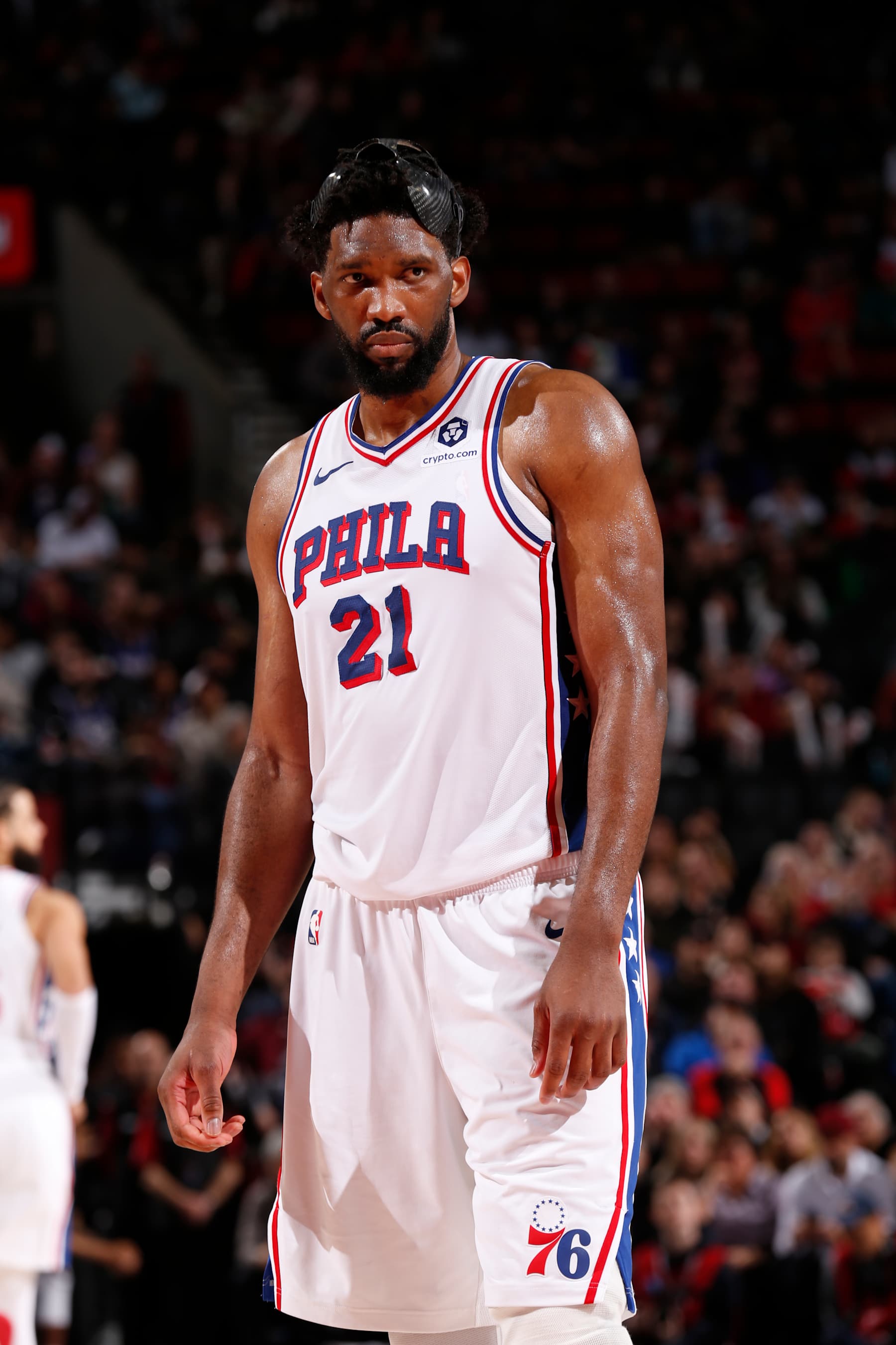 PORTLAND, OR - DECEMBER 30: Joel Embiid #21 of the Philadelphia 76ers looks on during the game against the Portland Trail Blazers on December 30, 2024 at the Moda Center Arena in Portland, Oregon. NOTE TO USER: User expressly acknowledges and agrees that, by downloading and or using this photograph, user is consenting to the terms and conditions of the Getty Images License Agreement. Mandatory Copyright Notice: Copyright 2024 NBAE (Photo by Cameron Browne/NBAE via Getty Images)