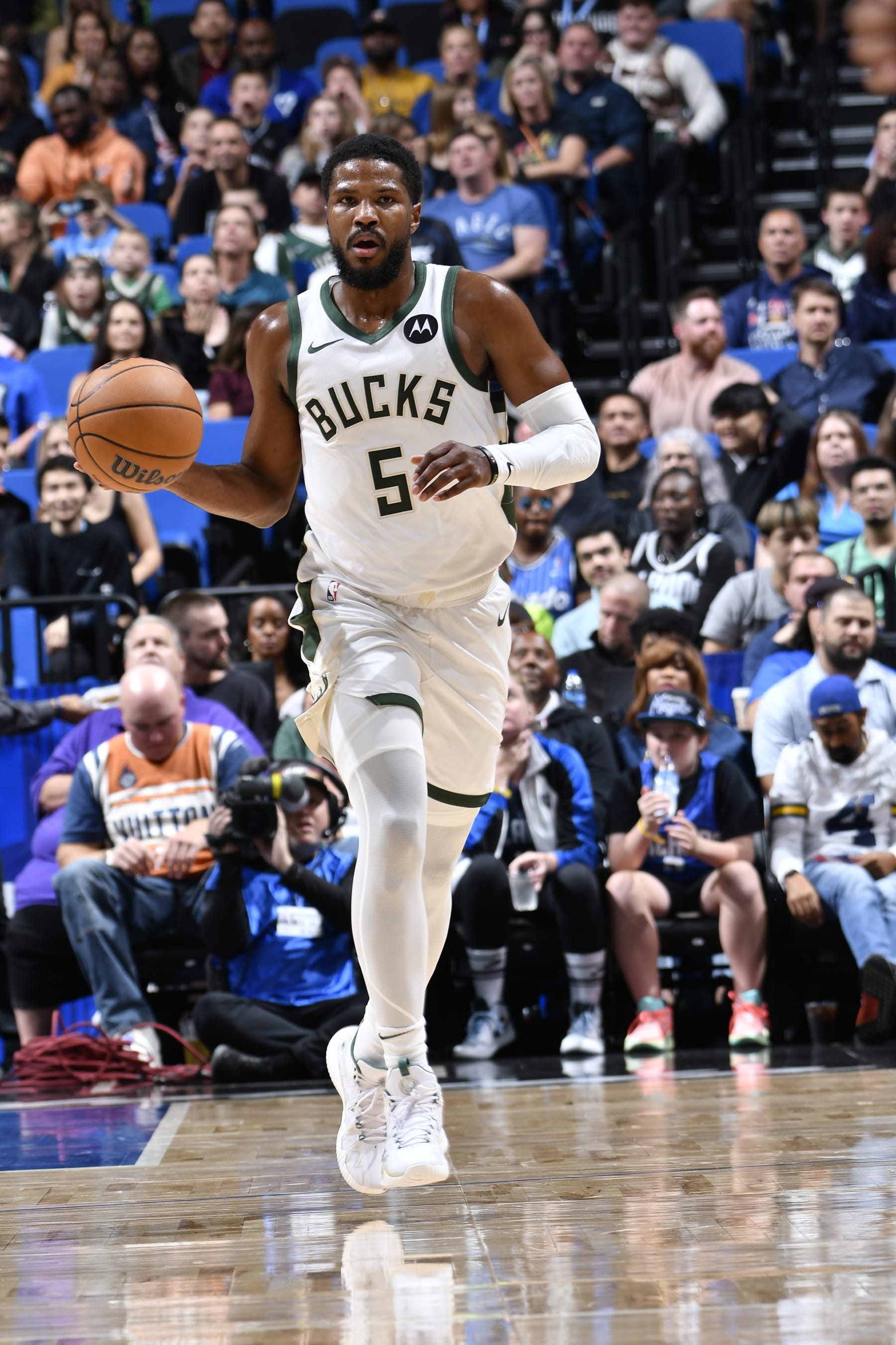 ORLANDO, FL - NOVEMBER 11: Malik Beasley #5 of the Milwaukee Bucks brings the ball up court against the Orlando Magic on NOVEMBER 11, 2023 at Amway Center in Orlando, Florida. NOTE TO USER: User expressly acknowledges and agrees that, by downloading and or using this photograph, User is consenting to the terms and conditions of the Getty Images License Agreement. Mandatory Copyright Notice: Copyright 2023 NBAE (Photo by Fernando Medina/NBAE via Getty Images)