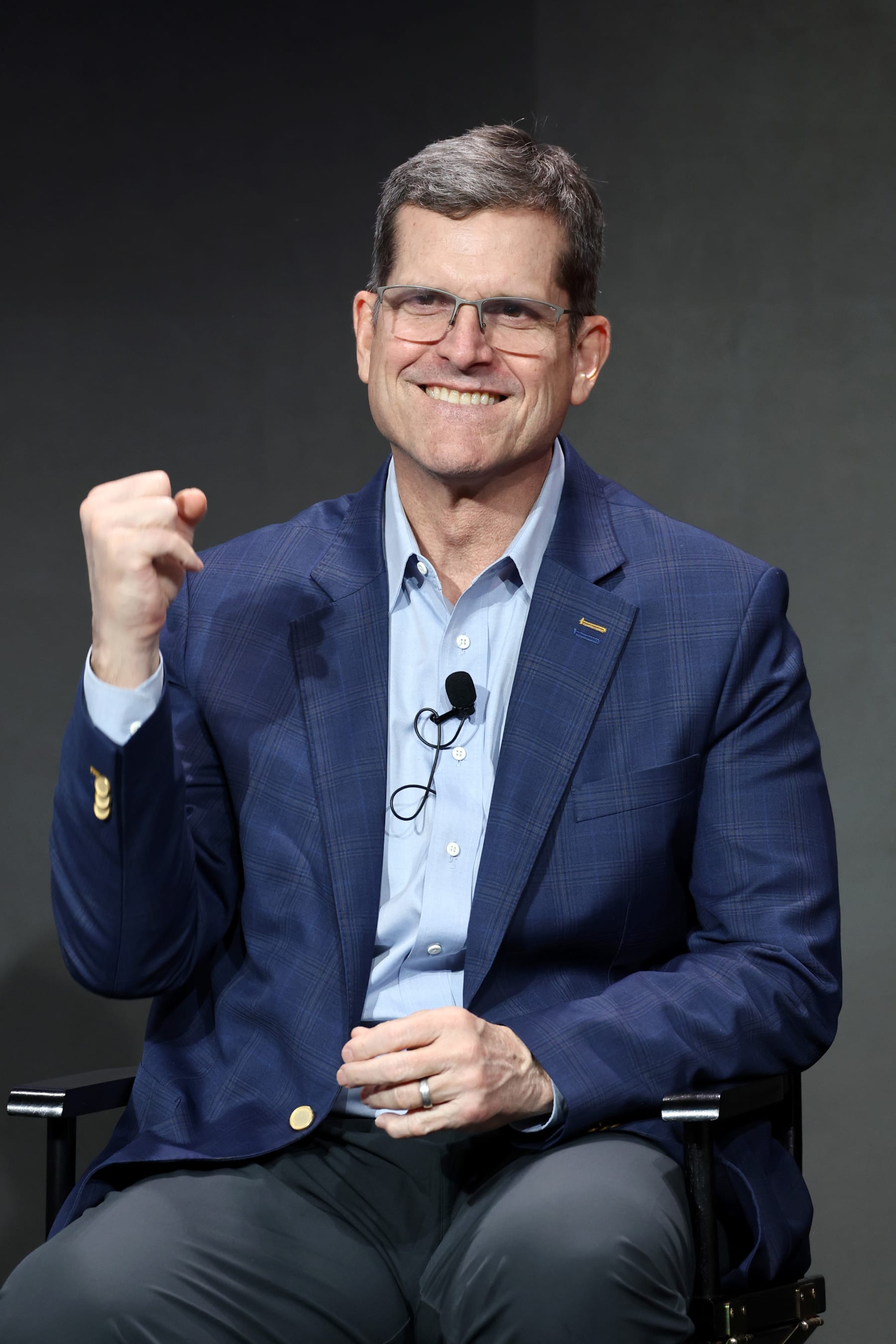 LAS VEGAS, NEVADA - FEBRUARY 09: Jim Harbaugh speaks onstage during Verizon’s press conference at Verizon Live at Super Bowl LVIII on February 09, 2024 in Las Vegas, Nevada. (Photo by Mike Coppola/Getty Images for Verizon)