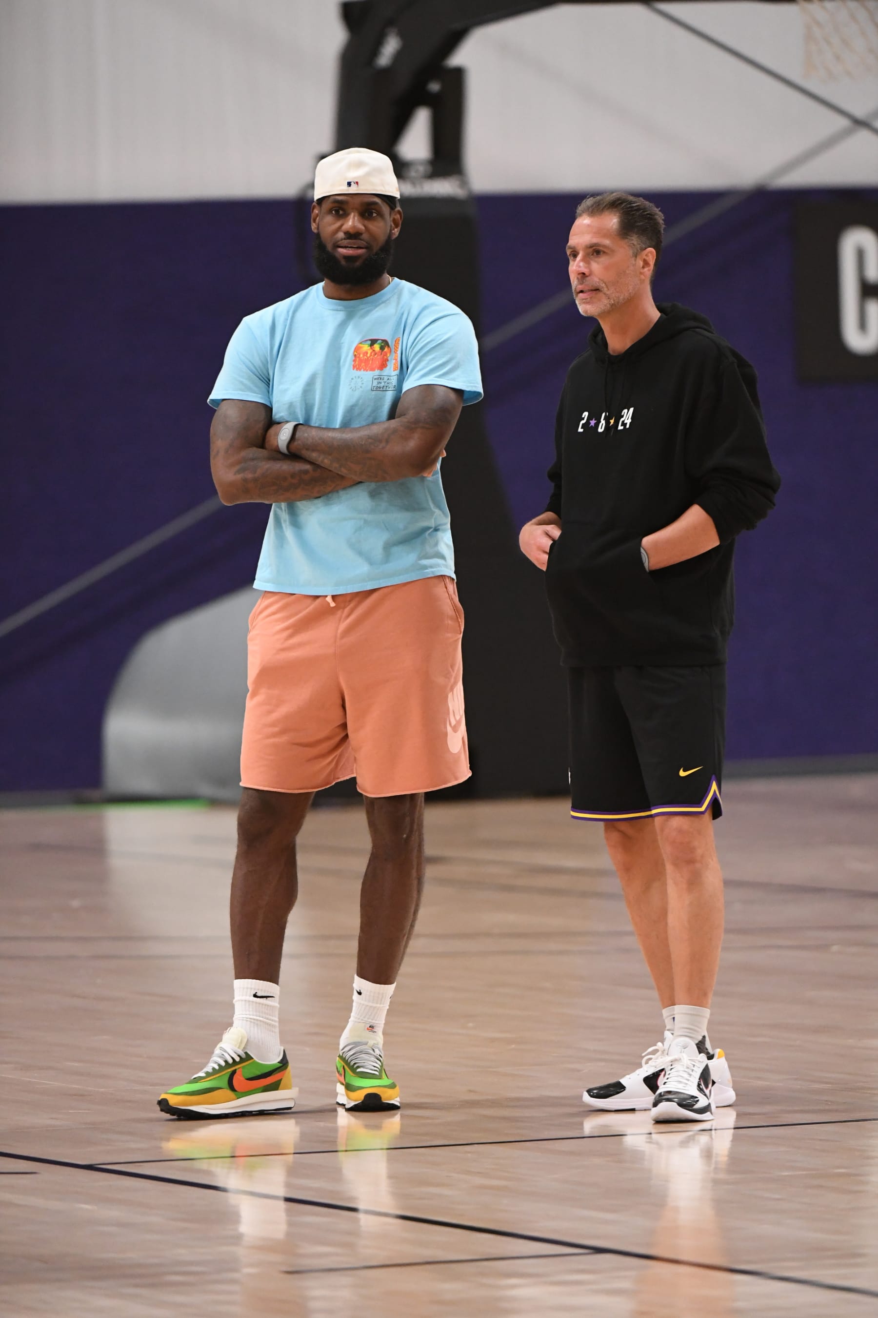 LAKE BUENA VISTA, FL - OCTOBER 1: LeBron James and General Manager Rob Pelinka of the Los Angeles Lakers during practice and media availability as part of the 2020 NBA Finals on October 1, 2020 at AdventHealth Arena at ESPN Wide World of Sports Complex in Lake Buena Vista, Florida. NOTE TO USER: User expressly acknowledges and agrees that, by downloading and or using this photograph, user is consenting to the terms and conditions of Getty Images License Agreement. Mandatory Copyright Notice: Copyright 2020 NBAE (Photo by Andrew D. Bernstein/NBAE via Getty Images)