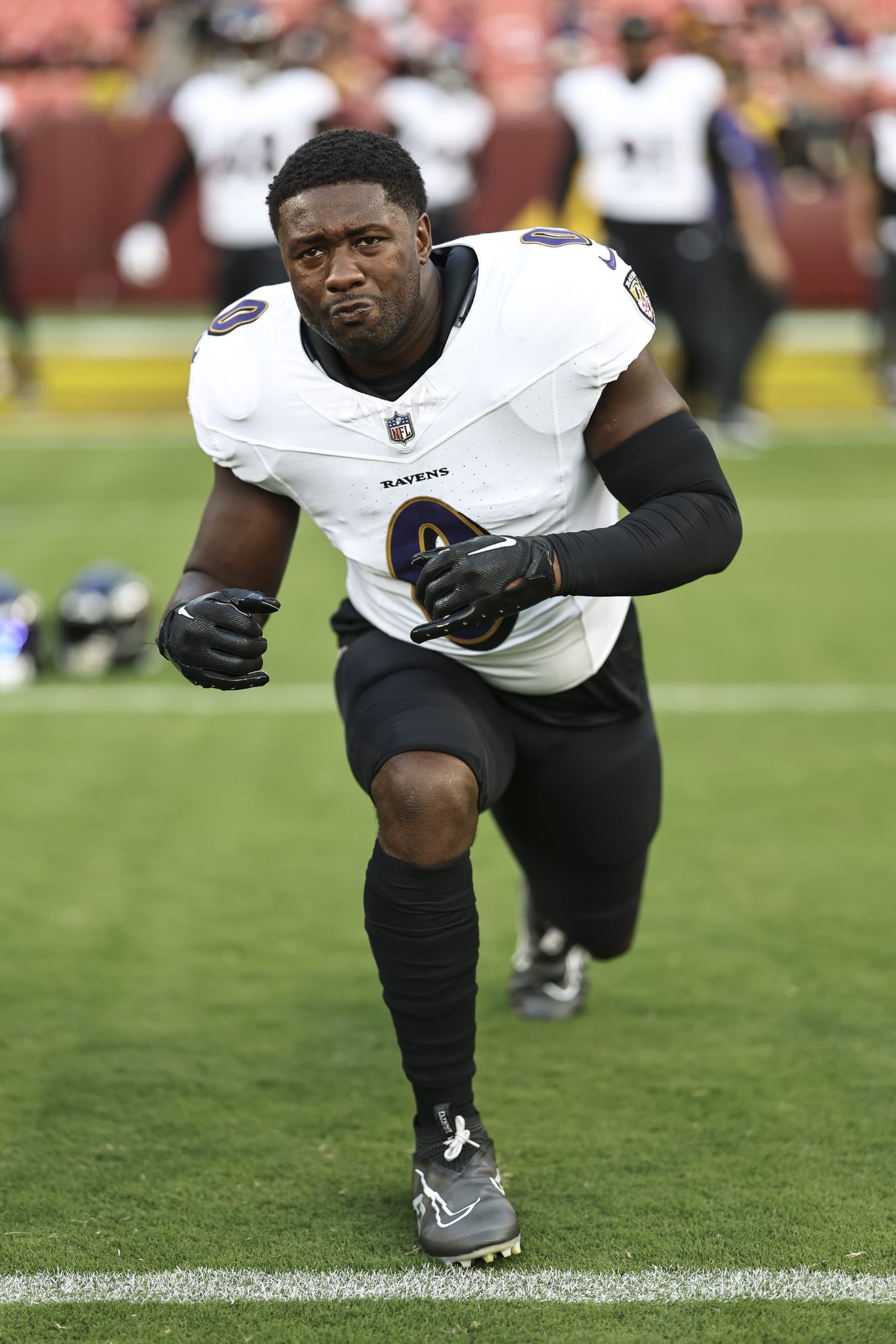LANDOVER, MARYLAND - AUGUST 21: Roquan Smith #0 of the Baltimore Ravens warms up prior to an NFL preseason game between the Washington Commanders and the Baltimore Ravens at FedExField on August 21, 2023 in Landover, Maryland. (Photo by Michael Owens/Getty Images)
