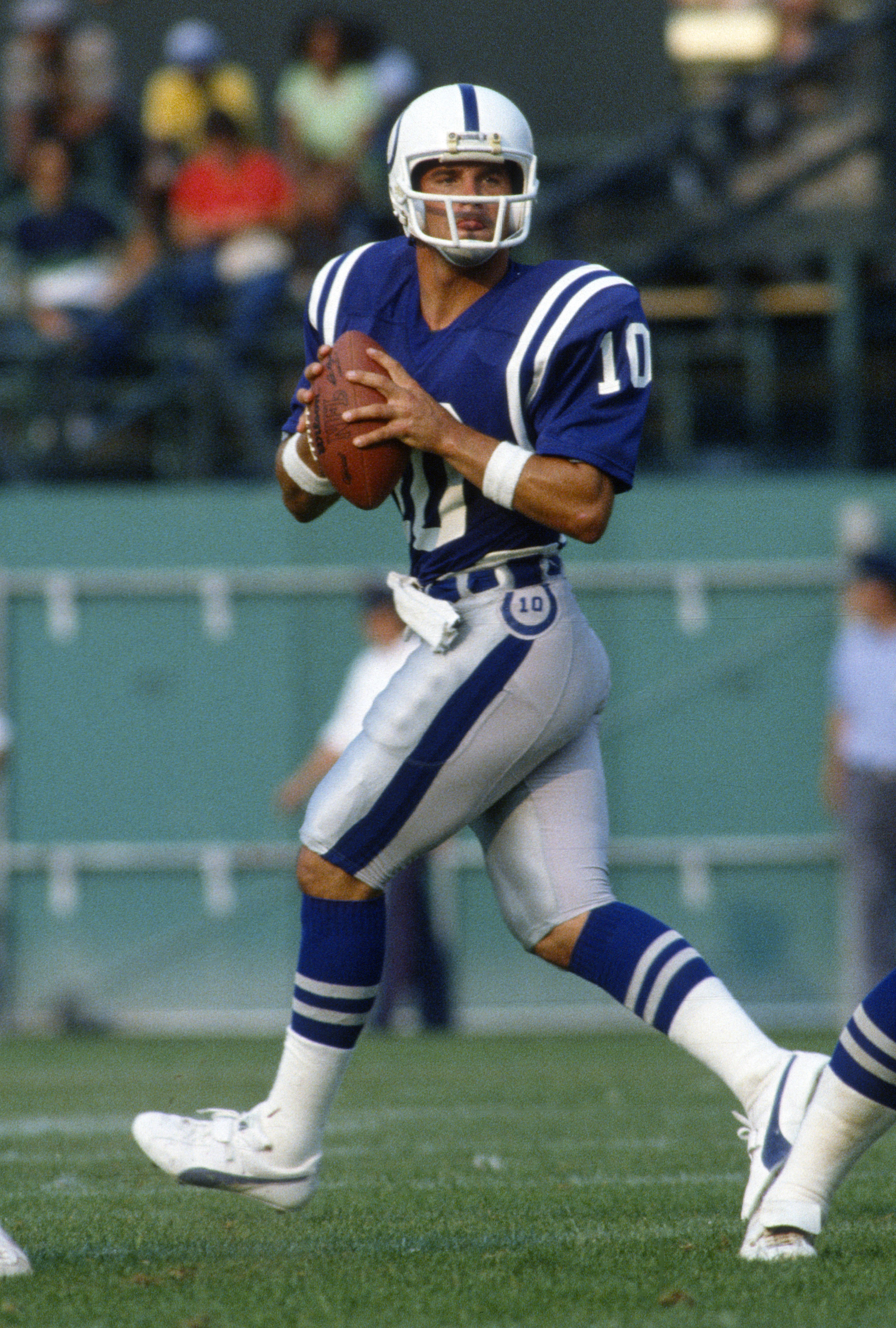 BALTIMORE, MD - SEPTEMBER 12:  Art Schlichter #10 of the Baltimore Colts drops back to pass against the New England Patriots during an NFL football game September 12, 1982 at Memorial Stadium in Baltimore, Maryland. Schlichter played for the Colts from 1982-85. (Photo by Focus on Sport/Getty Images)