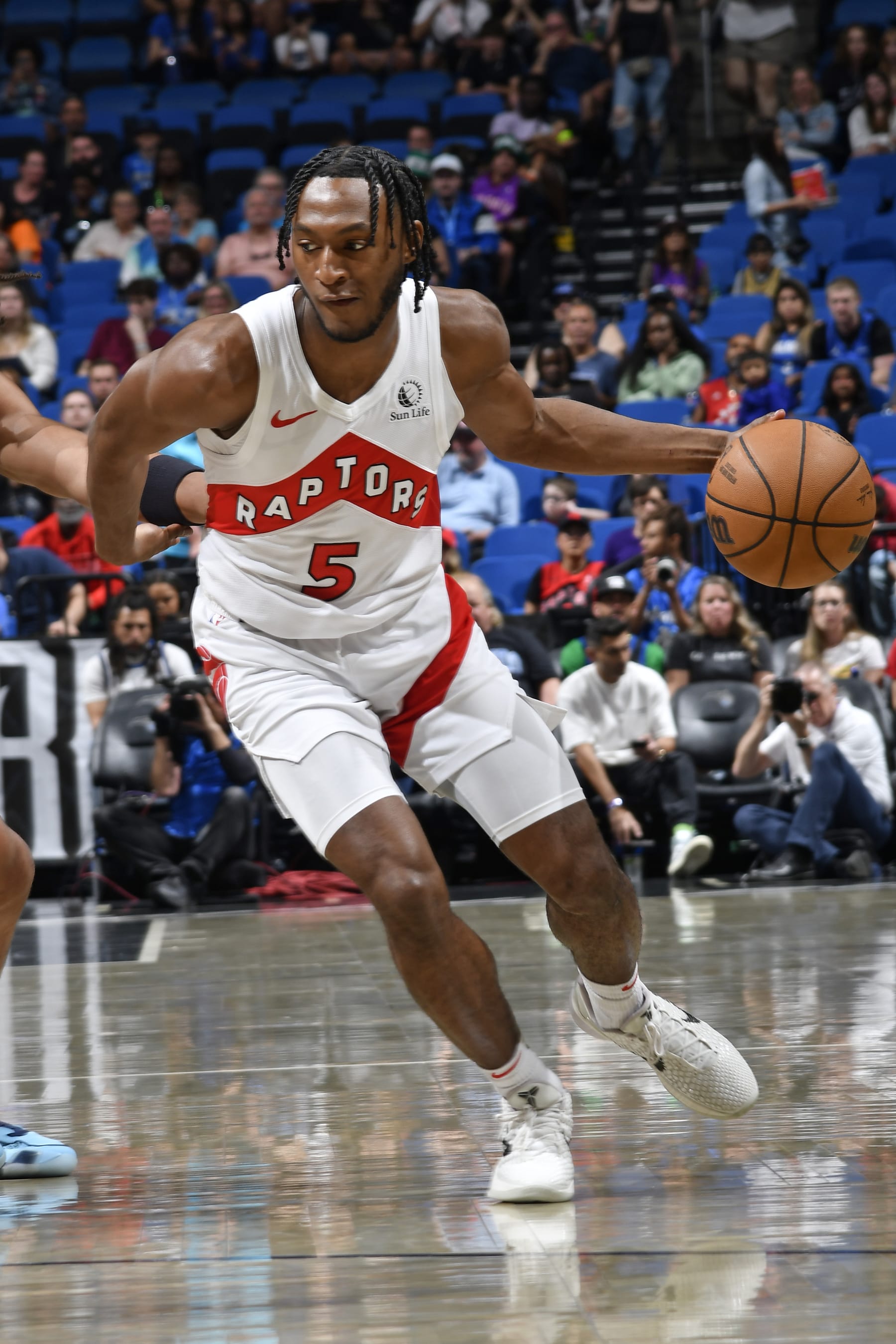 ORLANDO, FL - MARCH 17: Immanuel Quickley #5 of the Toronto Raptors dribbles the ball during the game against the Orlando Magic on March 17, 2024 at the Kia Center in Orlando, Florida. NOTE TO USER: User expressly acknowledges and agrees that, by downloading and or using this photograph, User is consenting to the terms and conditions of the Getty Images License Agreement. Mandatory Copyright Notice: Copyright 2024 NBAE (Photo by Fernando Medina/NBAE via Getty Images)