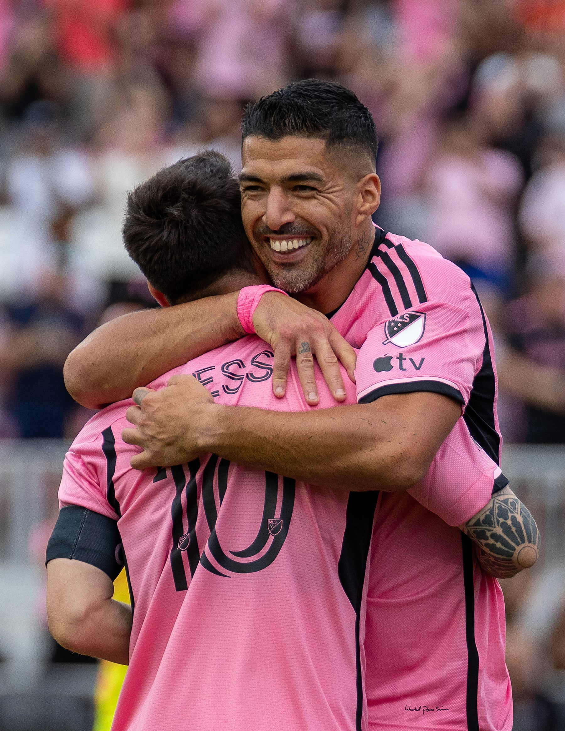Inter Miami Uruguayan forward #9 Luis Suarez and and Argentine forward #10 Lionel Messi celebrate a goal during the MLS football match between Orlando City and Inter Miami FC at Chase Stadium in Fort Lauderdale, Florida, on March 2, 2024. (Photo by Chris ARJOON / AFP) (Photo by CHRIS ARJOON/AFP via Getty Images)