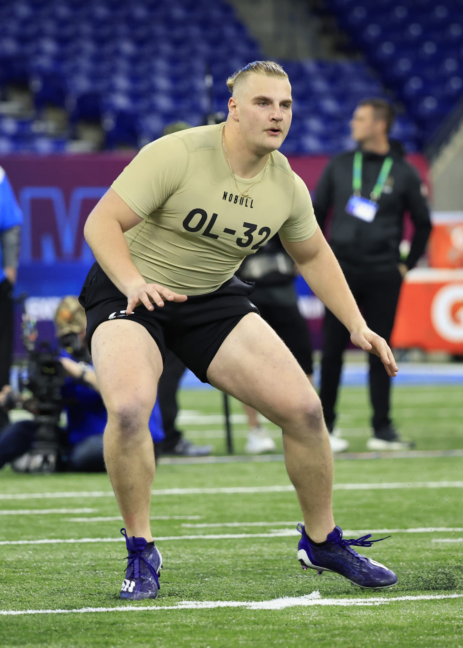 INDIANAPOLIS, INDIANA - MARCH 03: C J Hanson #OL32 of the Holy Cross  participates in a drill during the NFL Combine at Lucas Oil Stadium on March 03, 2024 in Indianapolis, Indiana. (Photo by Justin Casterline/Getty Images)