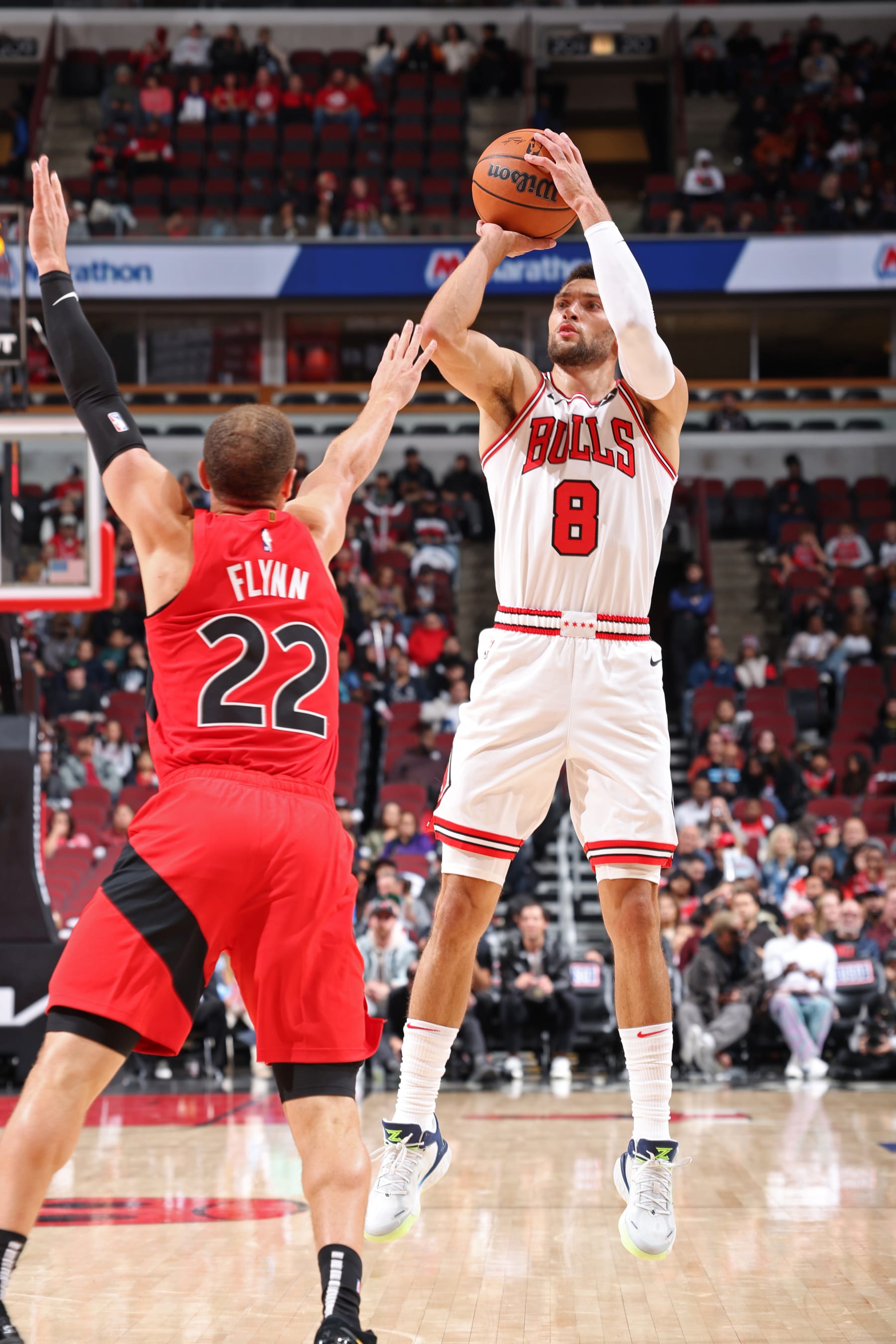 CHICAGO, IL - OCTOBER 17: Zach LaVine #8 of the Chicago Bulls shoots a three point basket against the Toronto Raptors on October 17, 2023 at United Center in Chicago, Illinois. NOTE TO USER: User expressly acknowledges and agrees that, by downloading and or using this photograph, User is consenting to the terms and conditions of the Getty Images License Agreement. Mandatory Copyright Notice: Copyright 2023 NBAE (Photo by Jeff Haynes/NBAE via Getty Images)