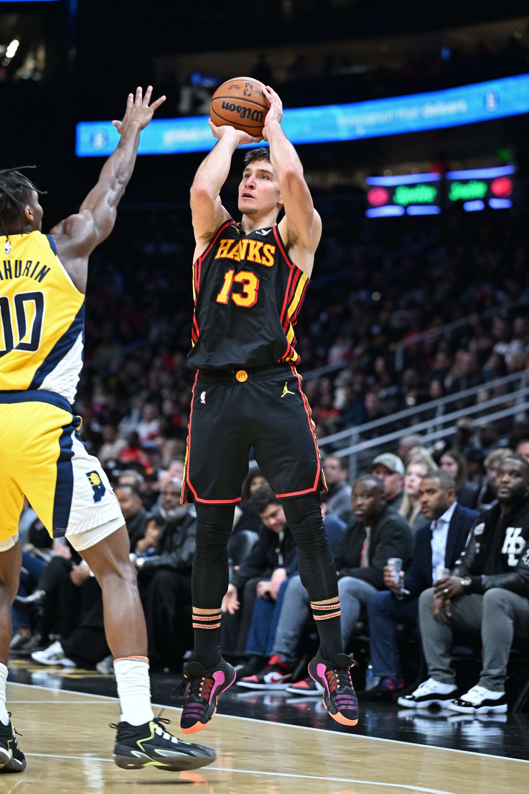 ATLANTA, GA - JANUARY 12: Bogdan Bogdanovic #13 of the Atlanta Hawks shoots the ball during the game against the Indiana Pacers on January 12, 2024 at State Farm Arena in Atlanta, Georgia.  NOTE TO USER: User expressly acknowledges and agrees that, by downloading and/or using this Photograph, user is consenting to the terms and conditions of the Getty Images License Agreement. Mandatory Copyright Notice: Copyright 2024 NBAE (Photo by Adam Hagy/NBAE via Getty Images)