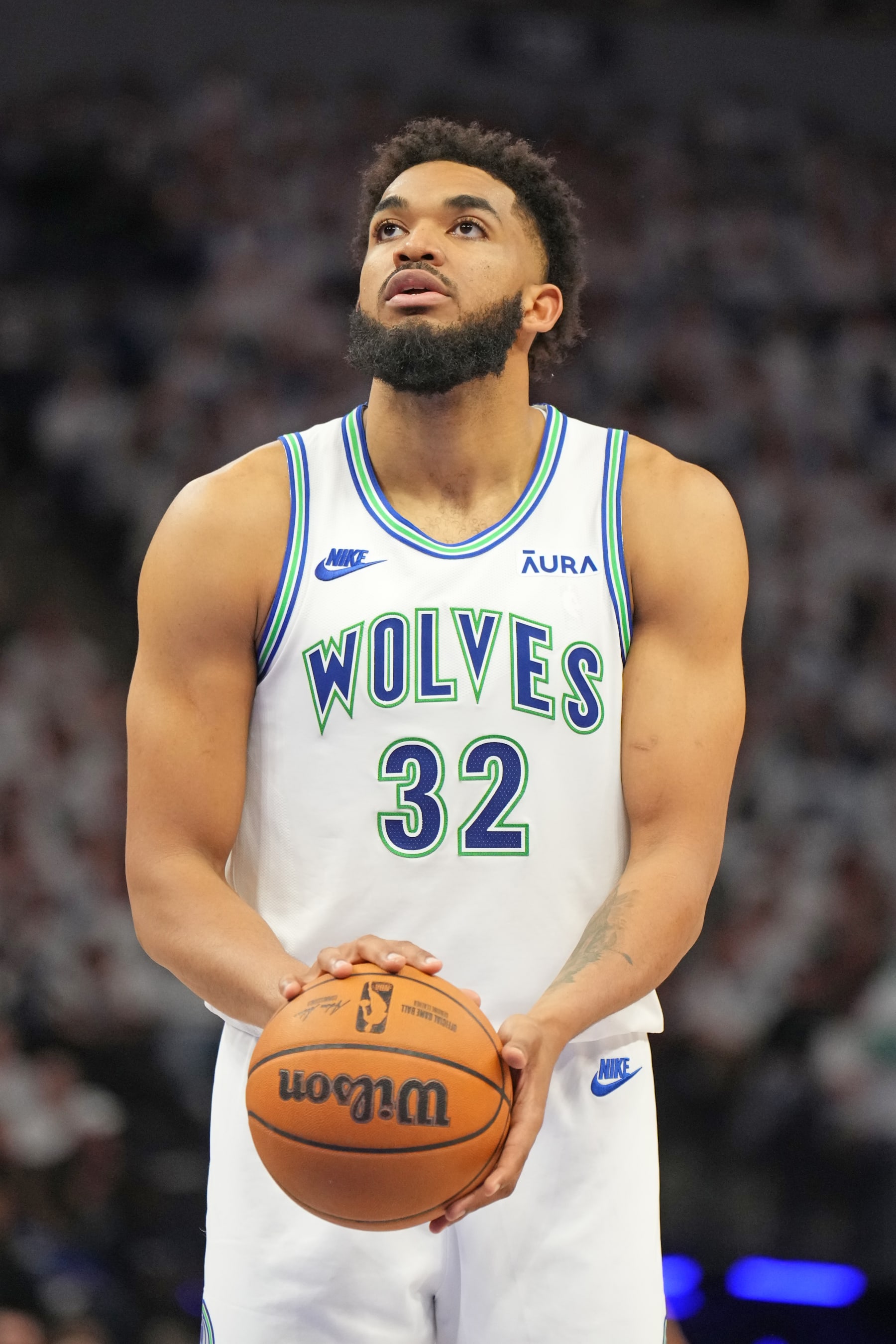 MINNEAPOLIS, MN - MAY 22: Karl-Anthony Towns #32 of the Minnesota Timberwolves shoots a free throw during the game against the Dallas Mavericks during Game 1 of the Western Conference Finals of the 2024 NBA Playoffs on May 22, 2024 at Target Center in Minneapolis, Minnesota. NOTE TO USER: User expressly acknowledges and agrees that, by downloading and or using this Photograph, user is consenting to the terms and conditions of the Getty Images License Agreement. Mandatory Copyright Notice: Copyright 2024 NBAE (Photo by Jesse D. Garrabrant/NBAE via Getty Images)