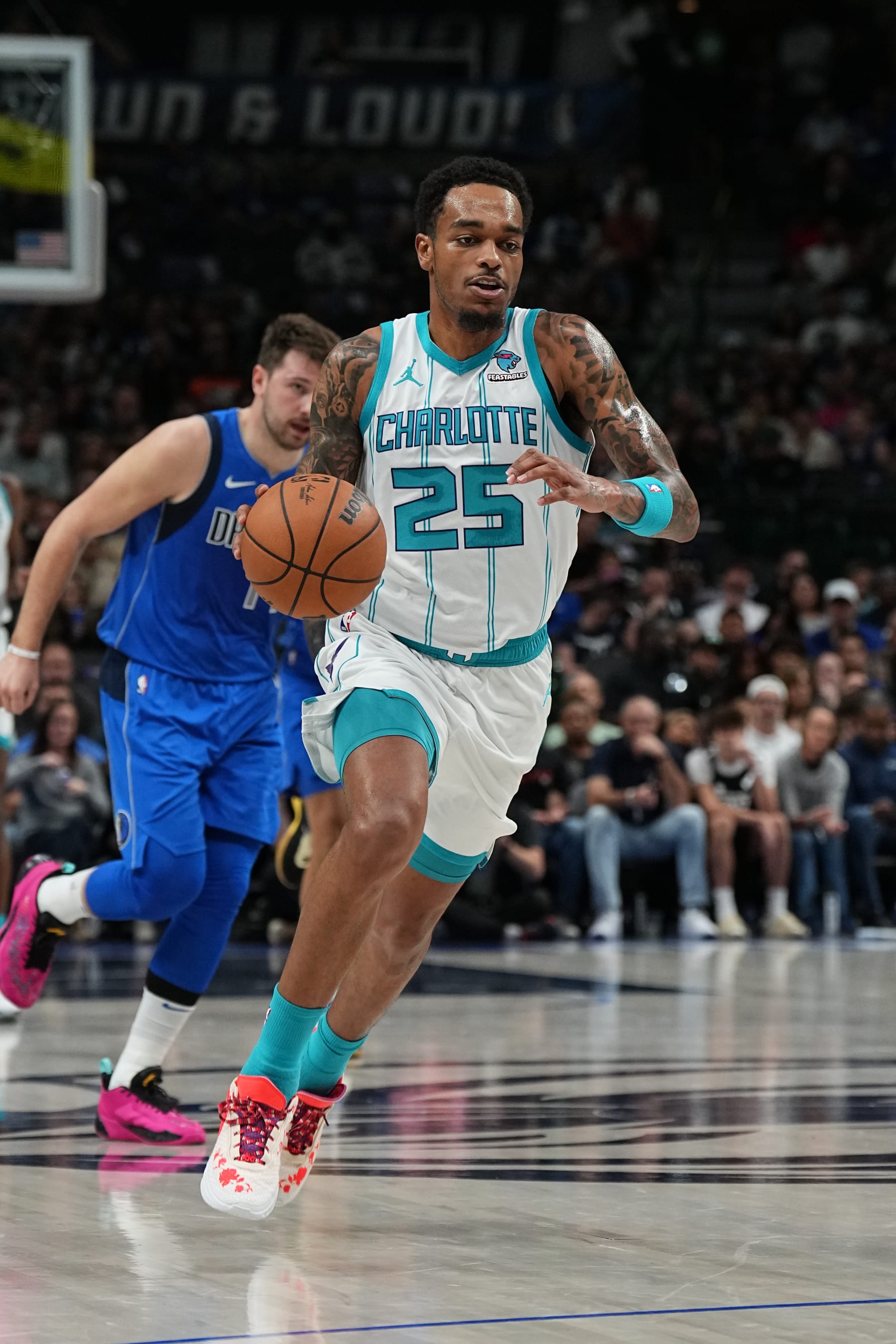 Luka DonÄiÄ and P.J. Washington