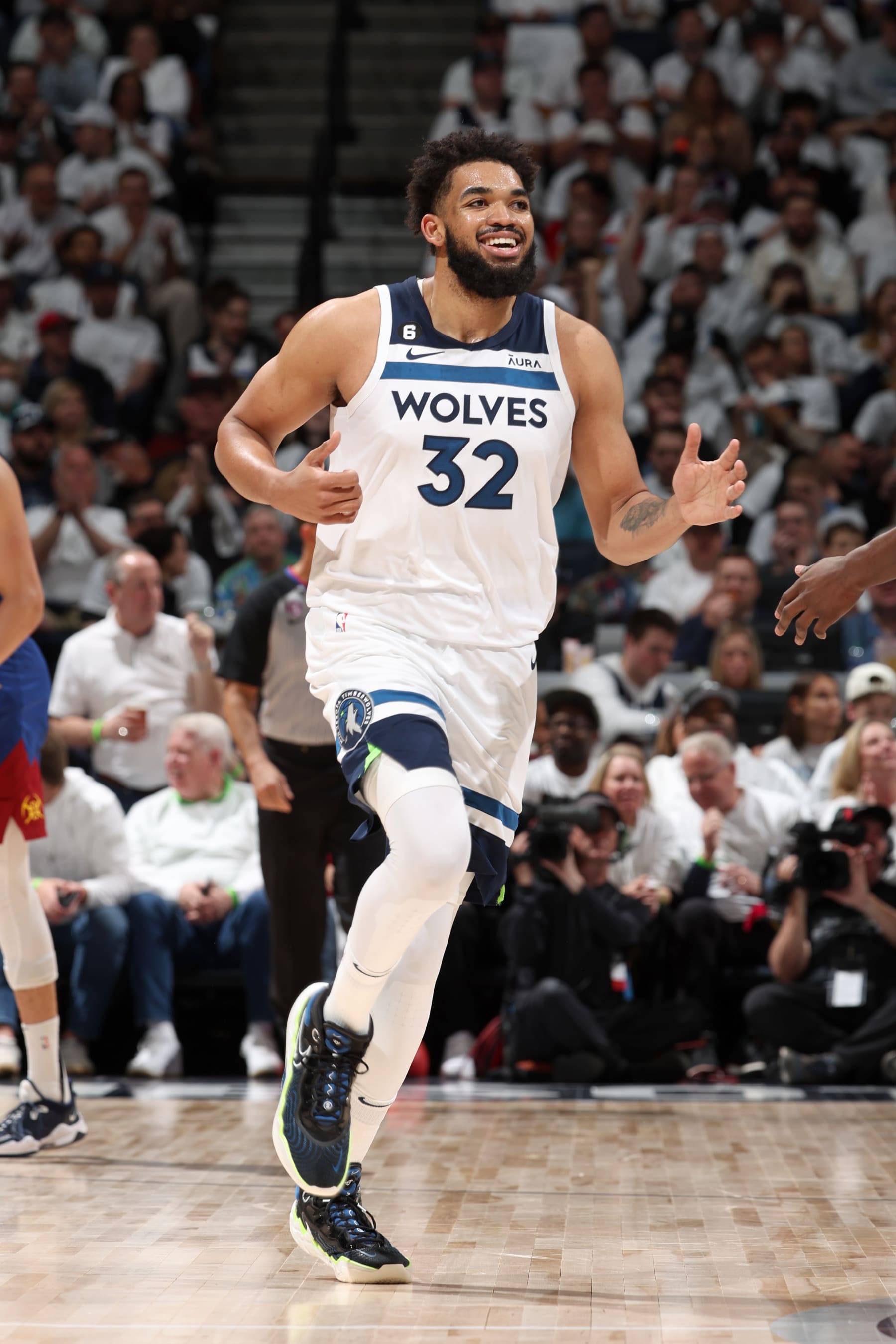 MINNEAPOLIS, MN -  APRIL 21: Karl-Anthony Towns #32 of the Minnesota Timberwolves looks on during the game against the Denver Nuggets during Round 1 Game 3 of the 2023 NBA Playoffs on April 21, 2023 at Target Center in Minneapolis, Minnesota. NOTE TO USER: User expressly acknowledges and agrees that, by downloading and or using this Photograph, user is consenting to the terms and conditions of the Getty Images License Agreement. Mandatory Copyright Notice: Copyright 2023 NBAE (Photo by David Sherman/NBAE via Getty Images)