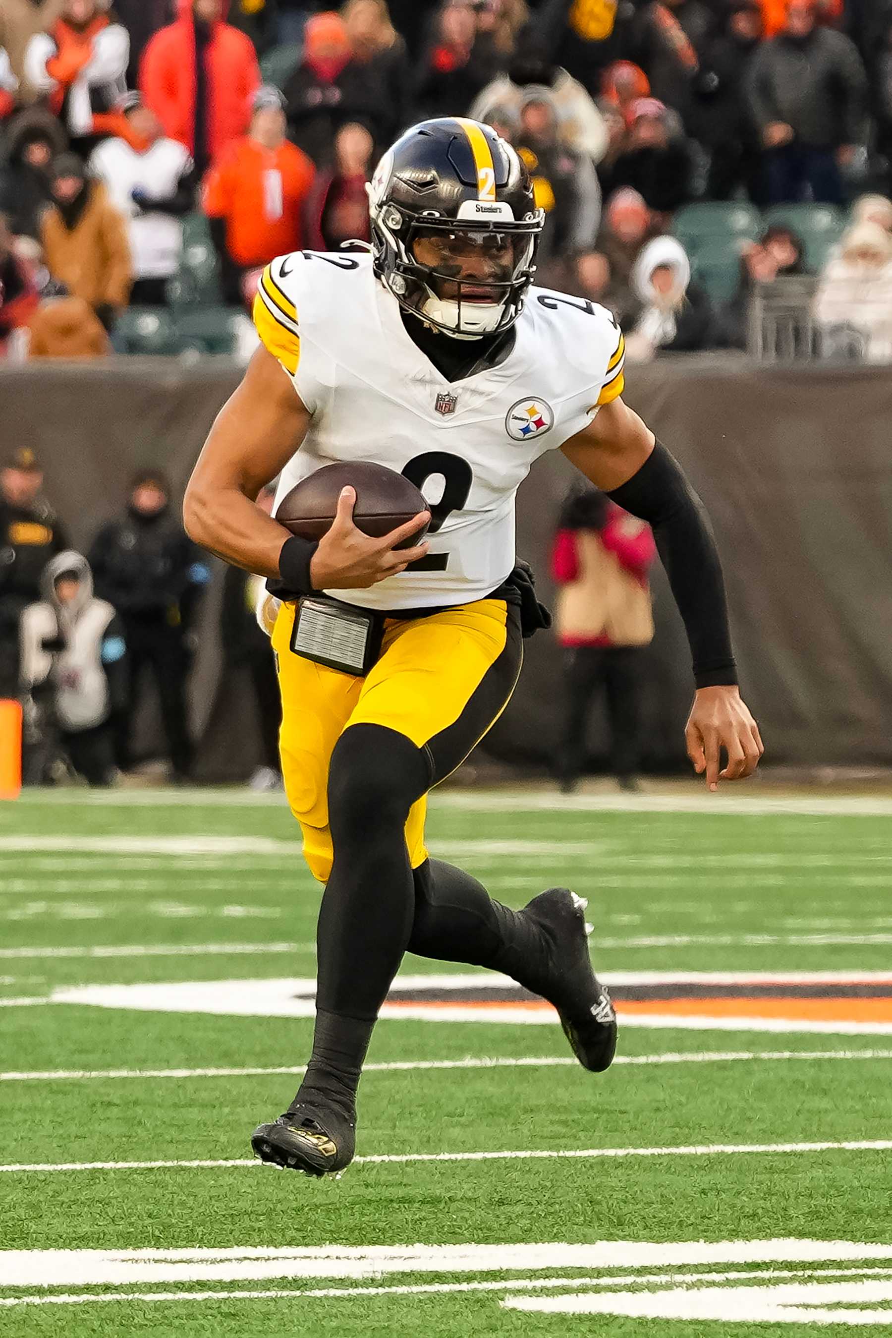 CINCINNATI, OHIO - DECEMBER 1: Quarterback Justin Fields #2 of the Pittsburgh Steelers scrambles out of the pocket during the second half of an NFL football game against the Cincinnati Bengals, at Paycor Stadium on December 1, 2024 in Cincinnati, Ohio. (Photo by Todd Rosenberg/Getty Images)
