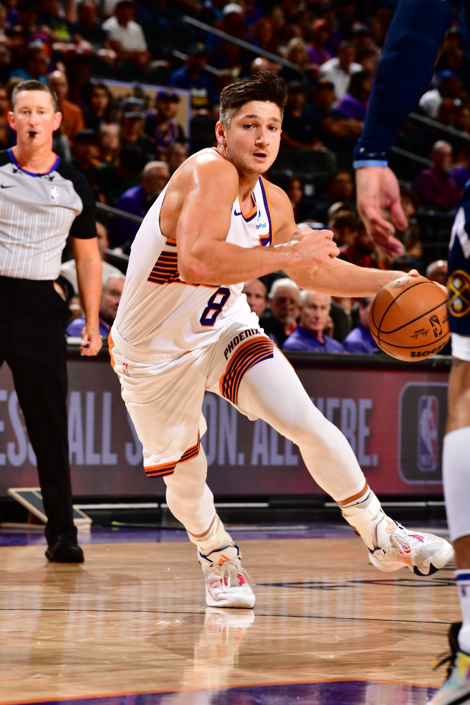 PHOENIX, AZ - OCTOBER 10: Grayson Allen #8 of the Phoenix Suns drives to the basket during the game against the Denver Nuggets on October 10, 2023 at Footprint Center in Phoenix, Arizona. NOTE TO USER: User expressly acknowledges and agrees that, by downloading and or using this photograph, user is consenting to the terms and conditions of the Getty Images License Agreement. Mandatory Copyright Notice: Copyright 2023 NBAE (Photo by Barry Gossage/NBAE via Getty Images)