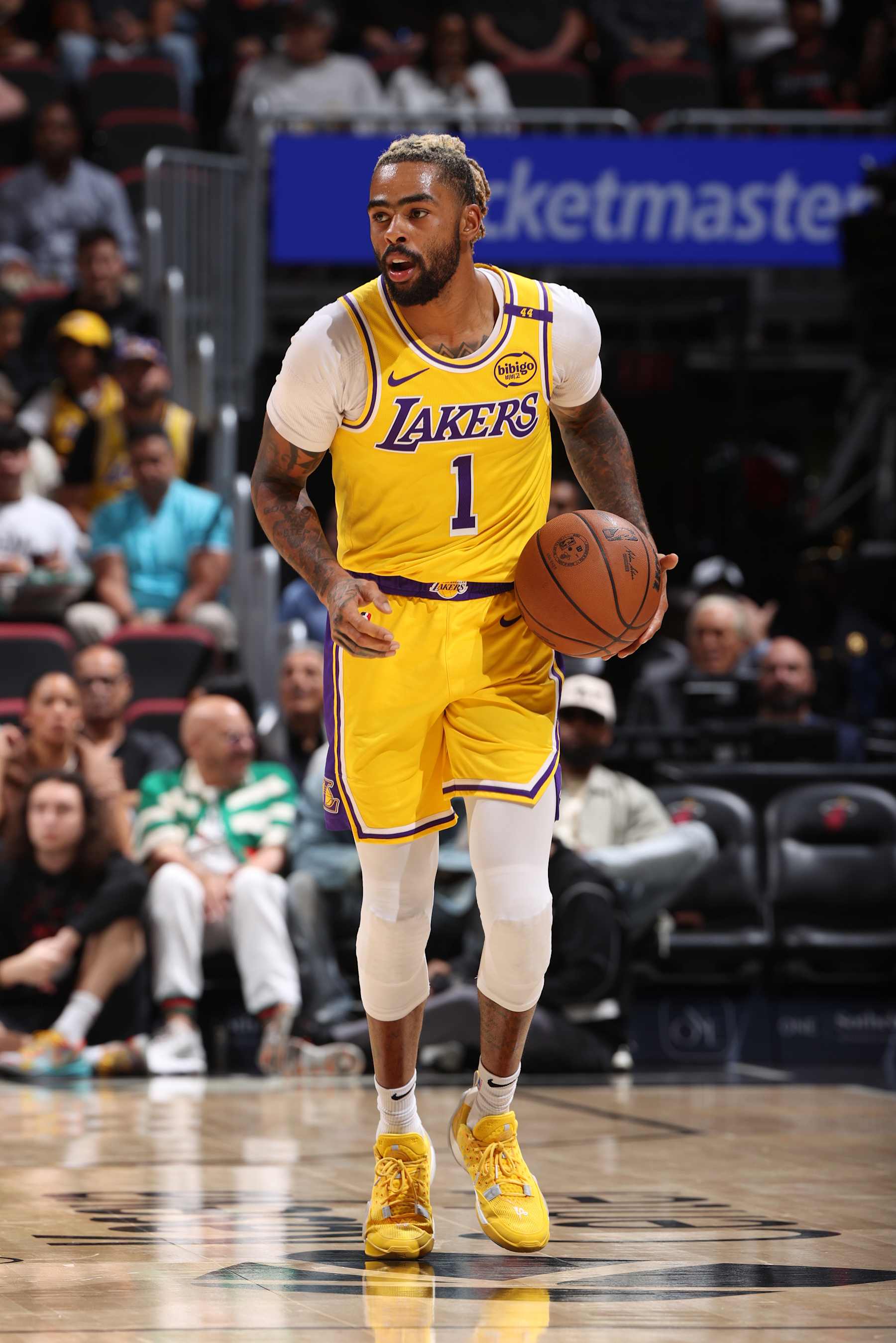 MIAMI, FL - DECEMBER 4:  D'Angelo Russell #1 of the Los Angeles Lakers handles the ball during the game against the Miami Heat on December 4, 2024 at Kaseya Center in Miami, Florida. NOTE TO USER: User expressly acknowledges and agrees that, by downloading and or using this Photograph, user is consenting to the terms and conditions of the Getty Images License Agreement. Mandatory Copyright Notice: Copyright 2024 NBAE (Photo by Joe Murphy/NBAE via Getty Images)