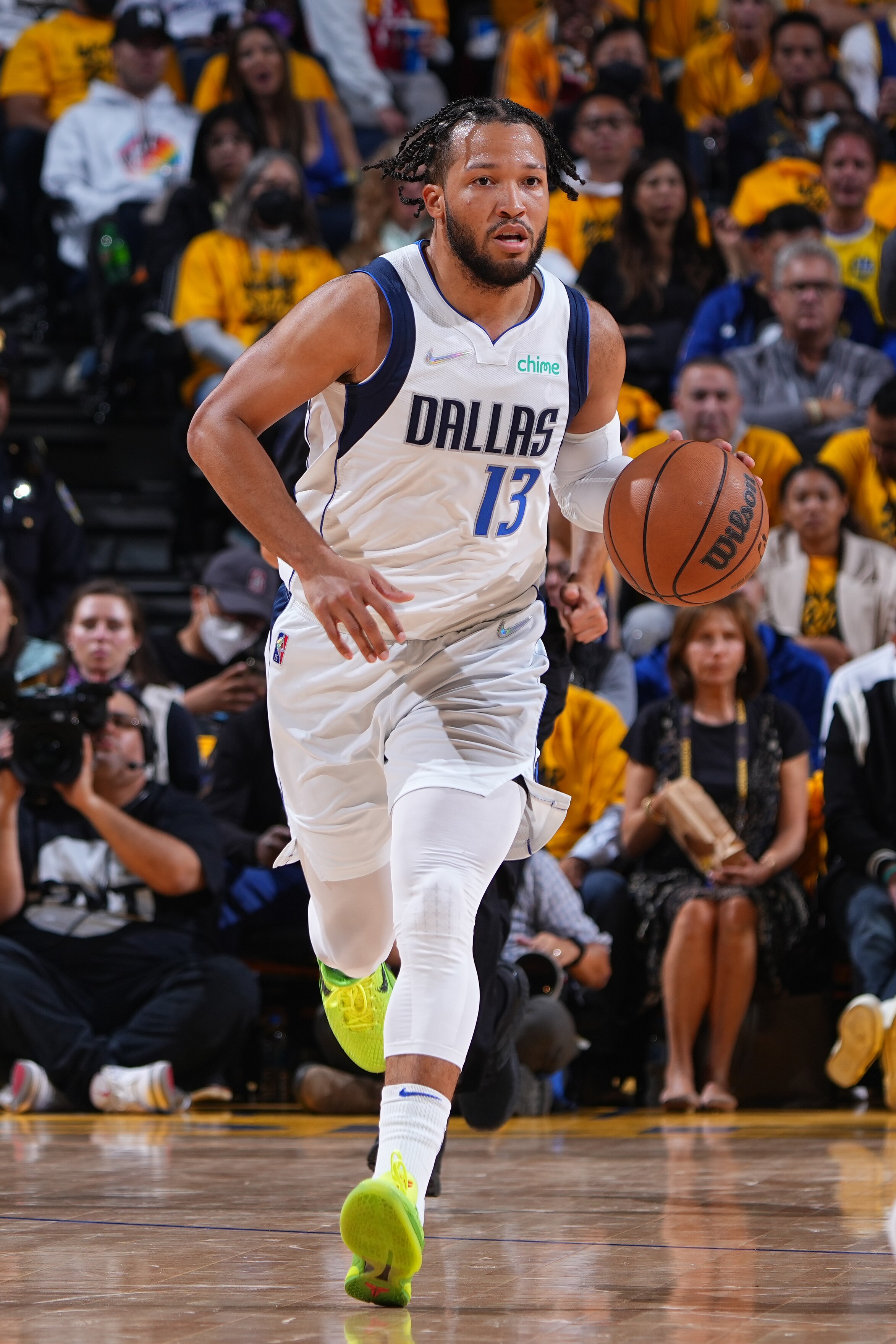 SAN FRANCISCO, CA - MAY 26: Jalen Brunson #13 of the Dallas Mavericks dribbles the ball against the Golden State Warriors during Game 5 of the 2022 NBA Playoffs Western Conference Finals on May 26, 2022 at Chase Center in San Francisco, California. NOTE TO USER: User expressly acknowledges and agrees that, by downloading and or using this photograph, user is consenting to the terms and conditions of Getty Images License Agreement. Mandatory Copyright Notice: Copyright 2022 NBAE (Photo by Garrett Ellwood/NBAE via Getty Images)