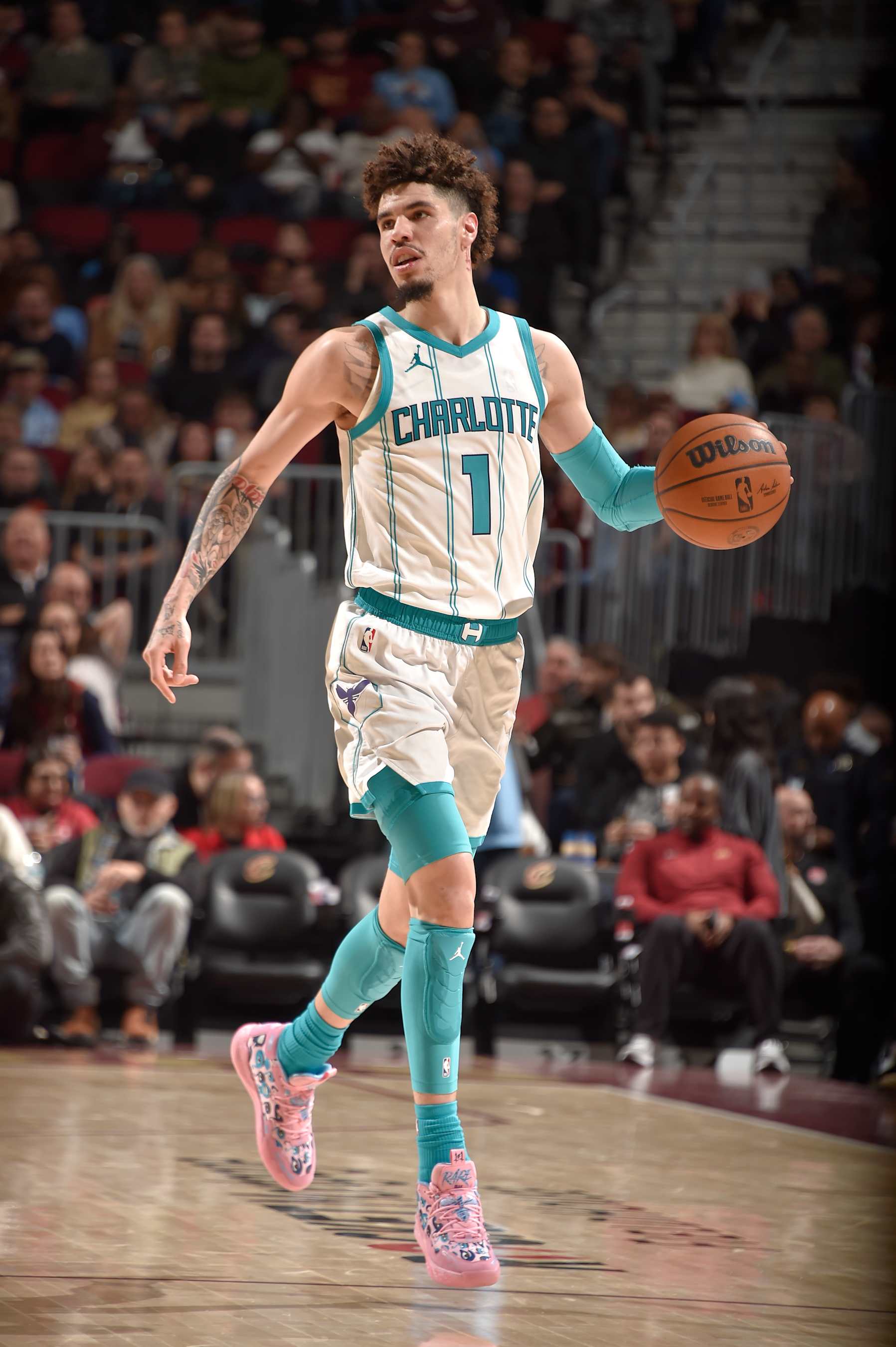 CLEVELAND, OH - JANUARY 5: LaMelo Ball #1 of the Charlotte Hornets dribbles the ball during the game against the Cleveland Cavaliers on January 5, 2025 at Rocket Mortgage FieldHouse in Cleveland, Ohio. NOTE TO USER: User expressly acknowledges and agrees that, by downloading and/or using this Photograph, user is consenting to the terms and conditions of the Getty Images License Agreement. Mandatory Copyright Notice: Copyright 2025 NBAE (Photo by David Liam Kyle/NBAE via Getty Images)