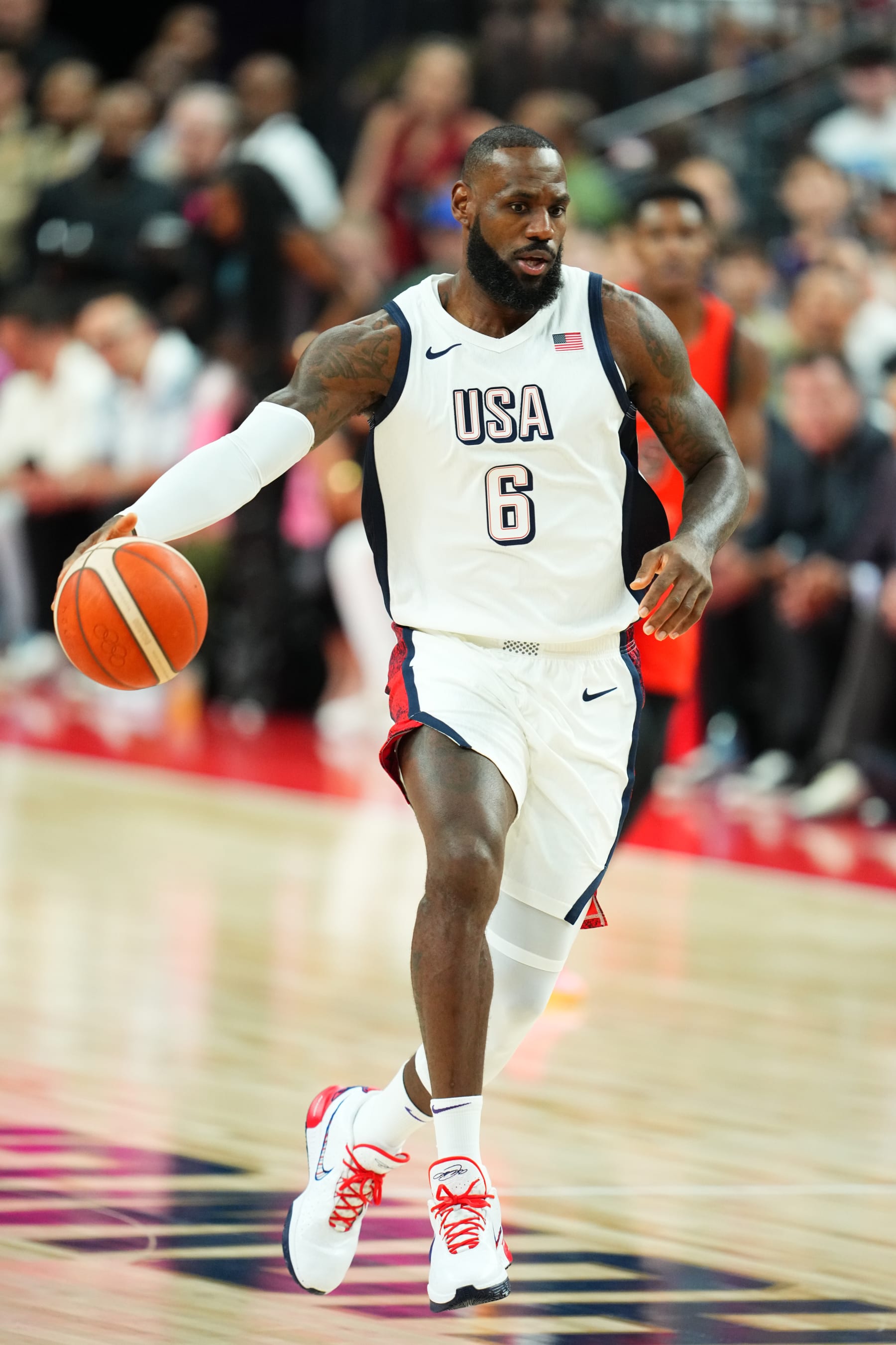 LAS VEGAS, NV - JULY 10: LeBron James #6 of the USA Basketball Men's Team dribbles the ball during the game against the Canada Basketball Men's Team on July 10, 2024 at the T-Mobile Arena in Las Vegas, Nevada. NOTE TO USER: User expressly acknowledges and agrees that, by downloading and/or using this Photograph, user is consenting to the terms and conditions of the Getty Images License Agreement. Mandatory Copyright Notice: Copyright 2024 NBAE (Photo by Jeff Bottari/NBAE via Getty Images)