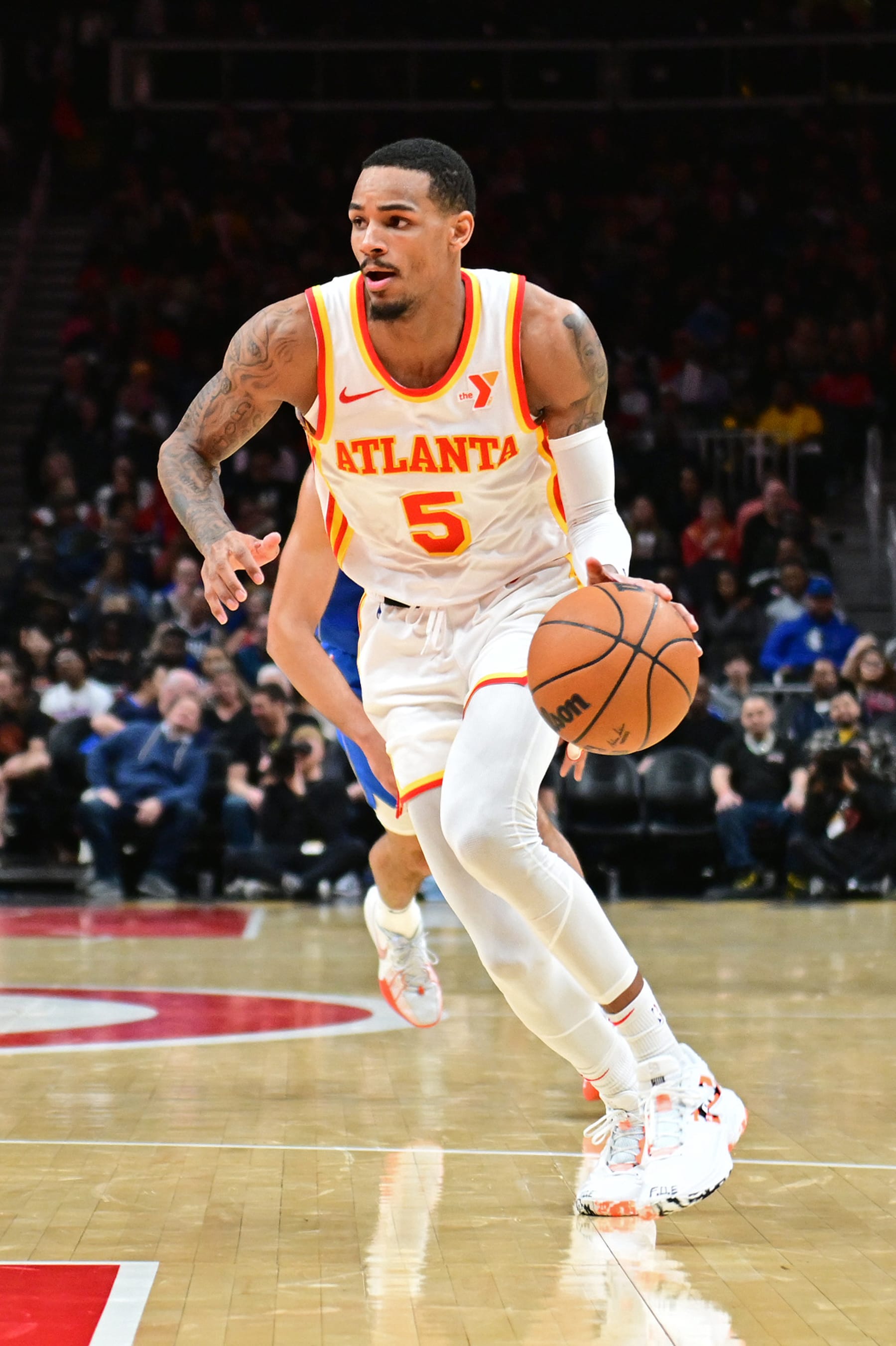 ATLANTA, GA - JANUARY 26: Dejounte Murray #5 of the Atlanta Hawks handles the ball during the game against the Dallas Mavericks on January 26, 2024 at State Farm Arena in Atlanta, Georgia.  NOTE TO USER: User expressly acknowledges and agrees that, by downloading and/or using this Photograph, user is consenting to the terms and conditions of the Getty Images License Agreement. Mandatory Copyright Notice: Copyright 2024 NBAE (Photo by Adam Hagy/NBAE via Getty Images)