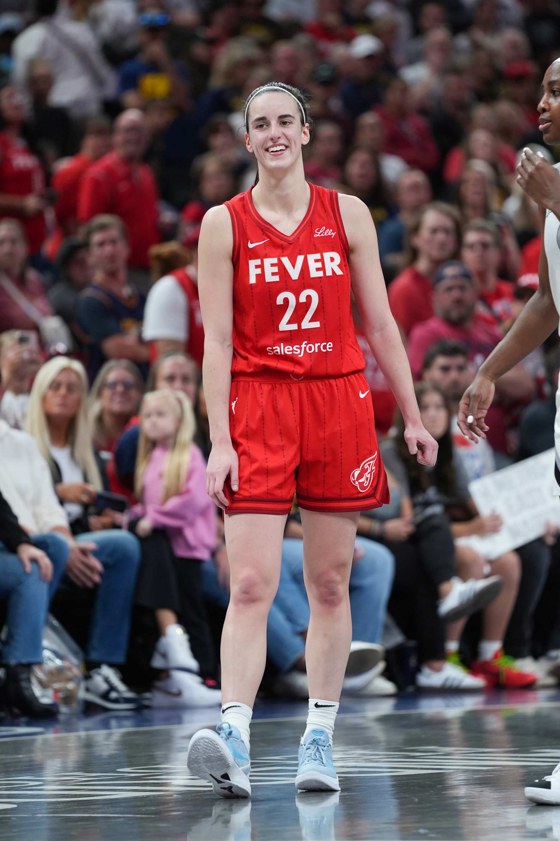 INDIANAPOLIS, IN - SEPTEMBER 13: Caitlin Clark #22 of the Indiana Fever smiles during the game against the Las Vegas Aces on September 13, 2024 at Gainbridge Fieldhouse in Indianapolis, Indiana. NOTE TO USER: User expressly acknowledges and agrees that, by downloading and or using this Photograph, user is consenting to the terms and conditions of the Getty Images License Agreement. Mandatory Copyright Notice: Copyright 2024 NBAE (Photo by Bri Lewerke/NBAE via Getty Images)
