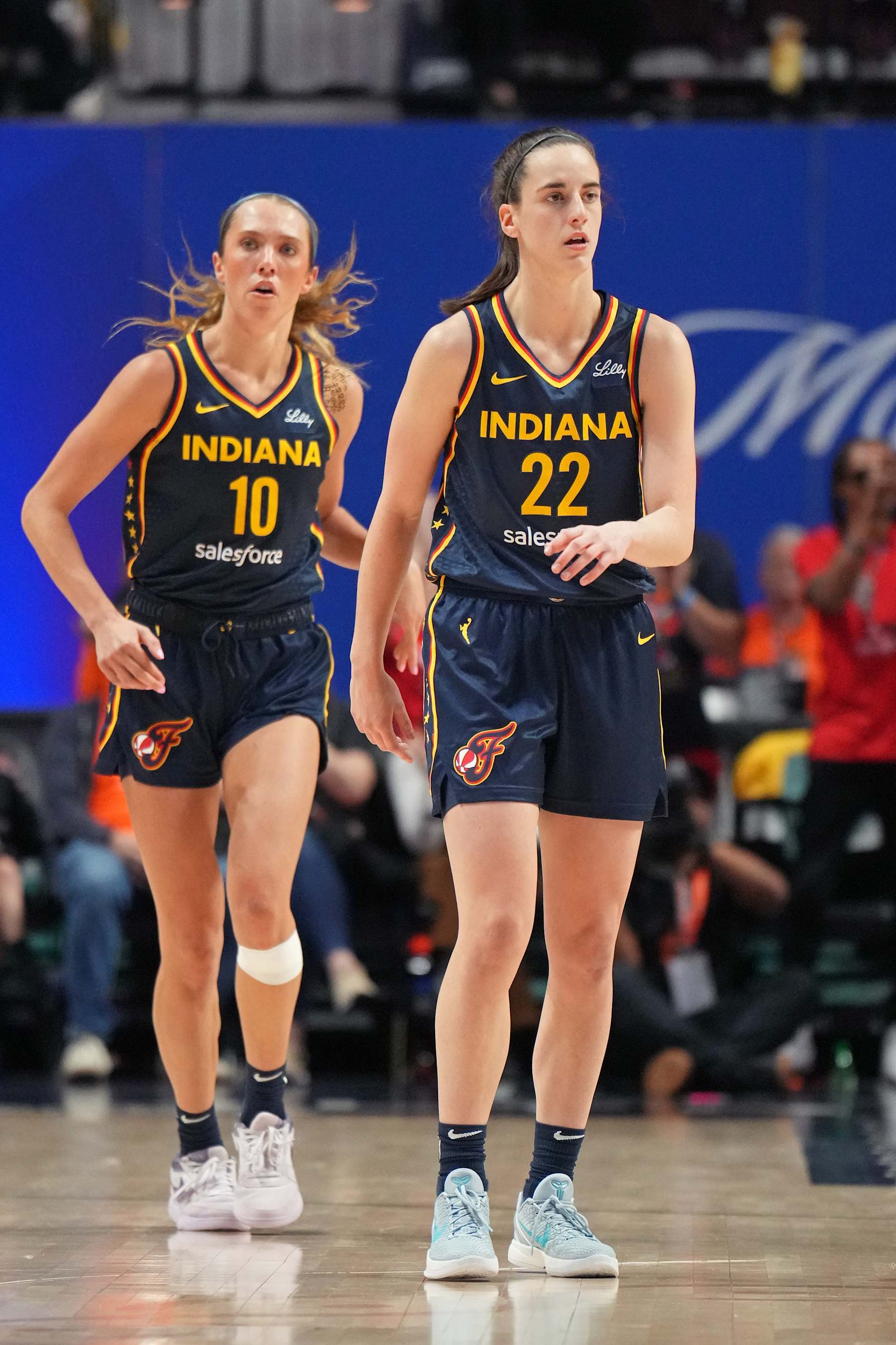 UNCASVILLE, CT - SEPTEMBER 22: Caitlin Clark #22 of the Indiana Fever looks on during the game against the Connecticut Sun during round one game one of the 2024 WNBA Playoffs on September 22, 2024 at the Mohegan Sun Arena in Uncasville, Connecticut. NOTE TO USER: User expressly acknowledges and agrees that, by downloading and or using this photograph, User is consenting to the terms and conditions of the Getty Images License Agreement. Mandatory Copyright Notice: Copyright 2024 NBAE (Photo by Jesse D. Garrabrant/NBAE via Getty Images)