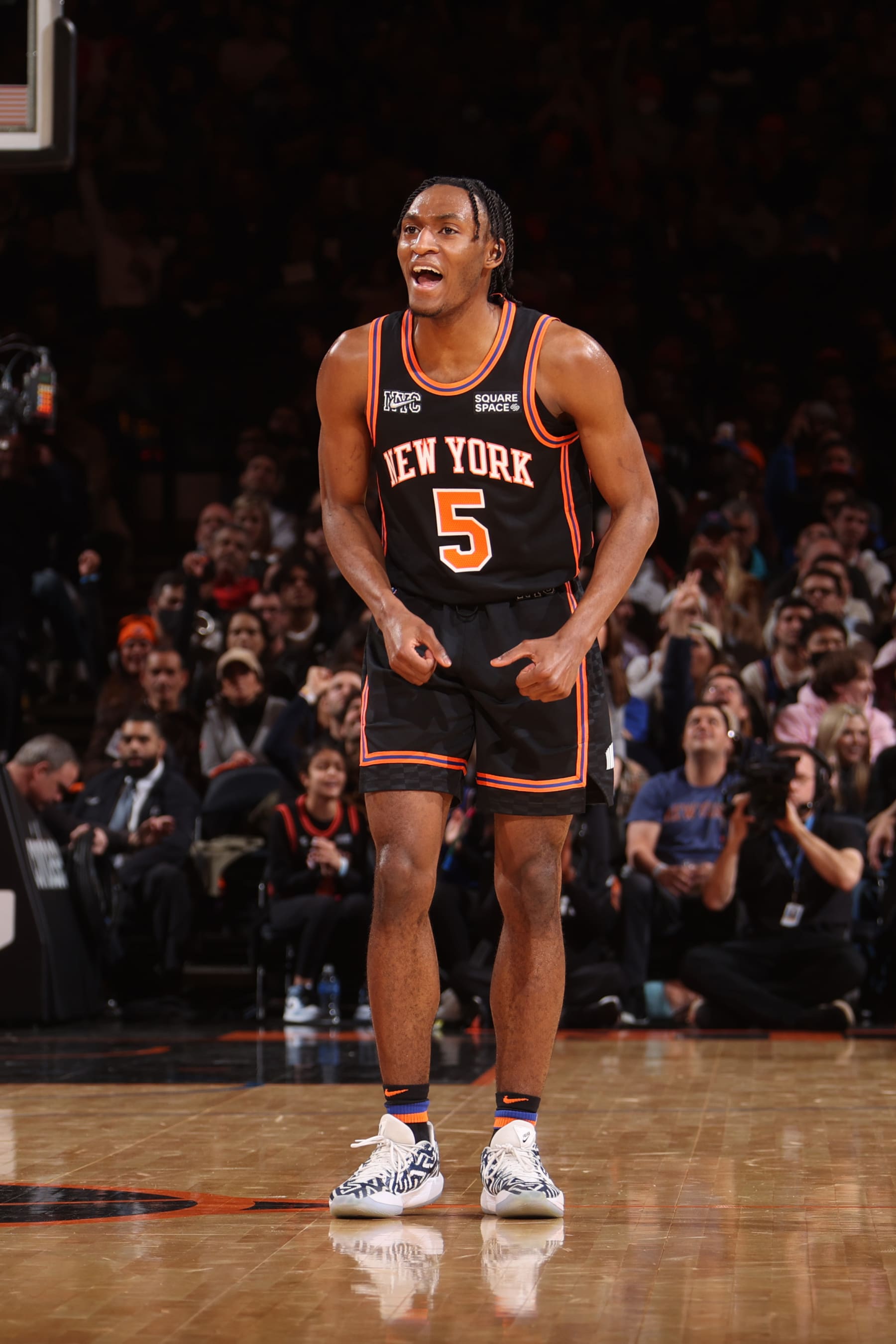 NEW YORK, NY - APRIL 6: Immanuel Quickley #5 of the New York Knicks celebrates during the game against the Brooklyn Nets on April 6, 2022 at Madison Square Garden in New York City, New York.  NOTE TO USER: User expressly acknowledges and agrees that, by downloading and or using this photograph, User is consenting to the terms and conditions of the Getty Images License Agreement. Mandatory Copyright Notice: Copyright 2022 NBAE  (Photo by Nathaniel S. Butler/NBAE via Getty Images)